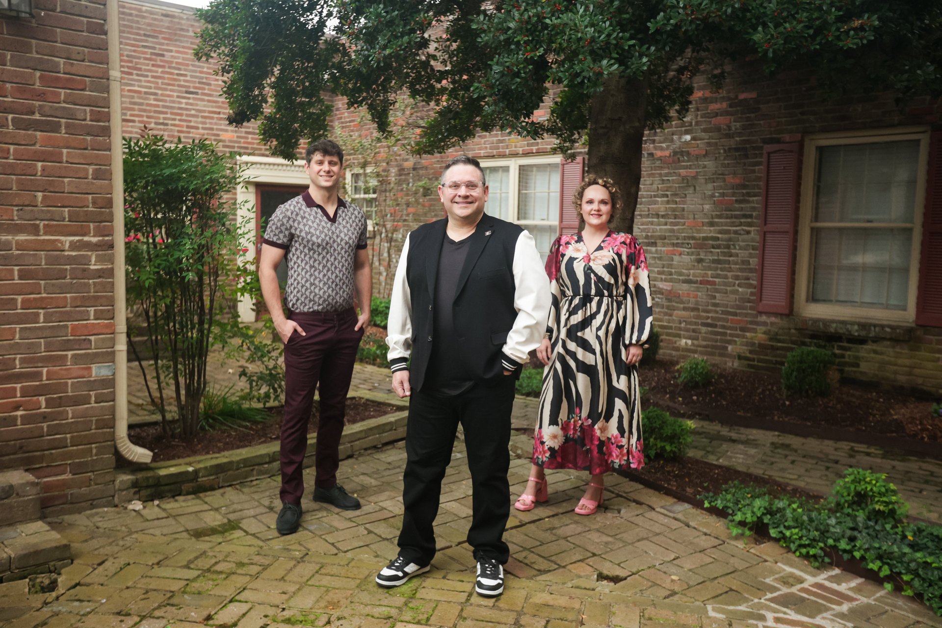group of people waving their hands