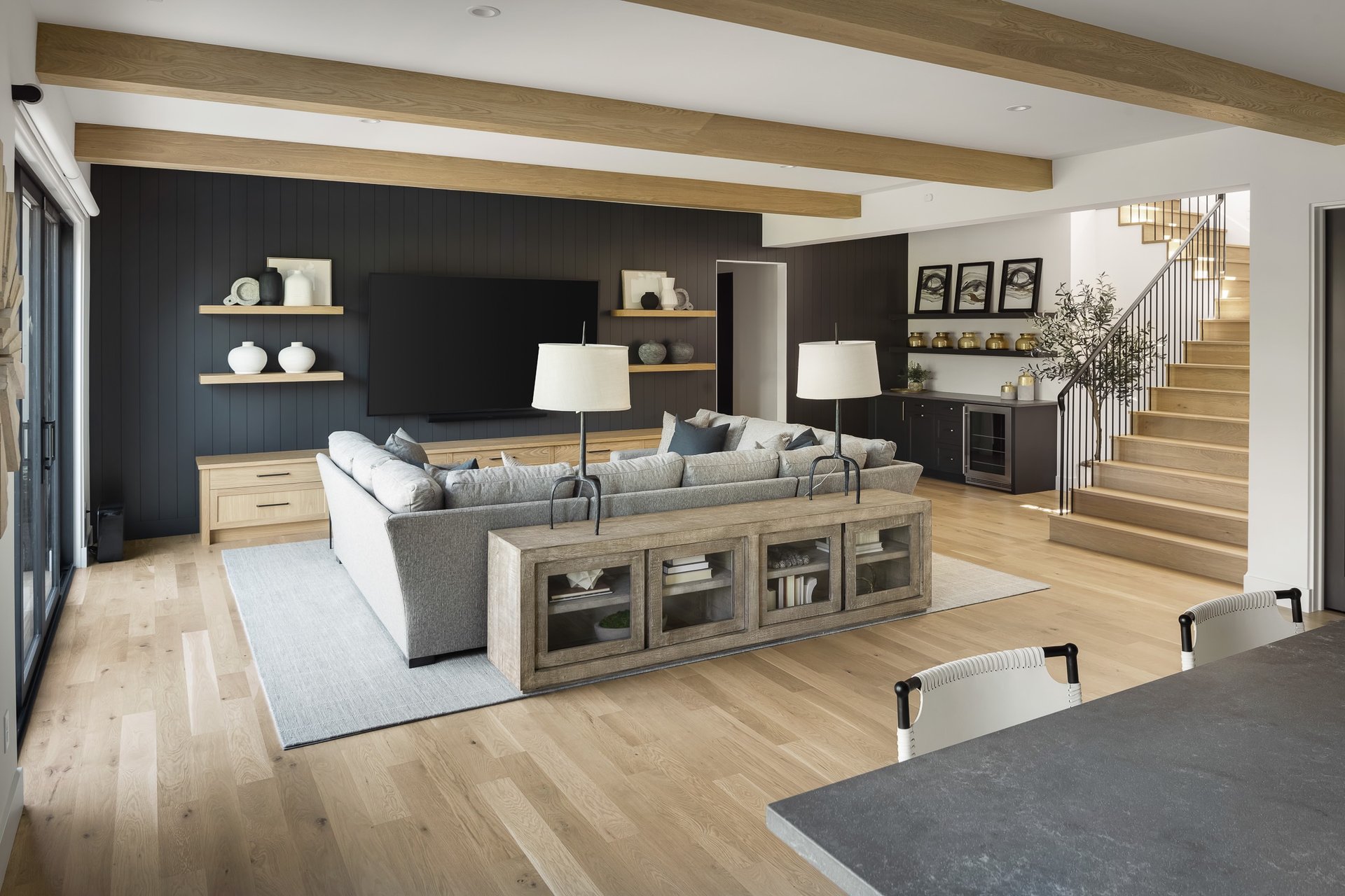 black and brown leather padded tub sofa