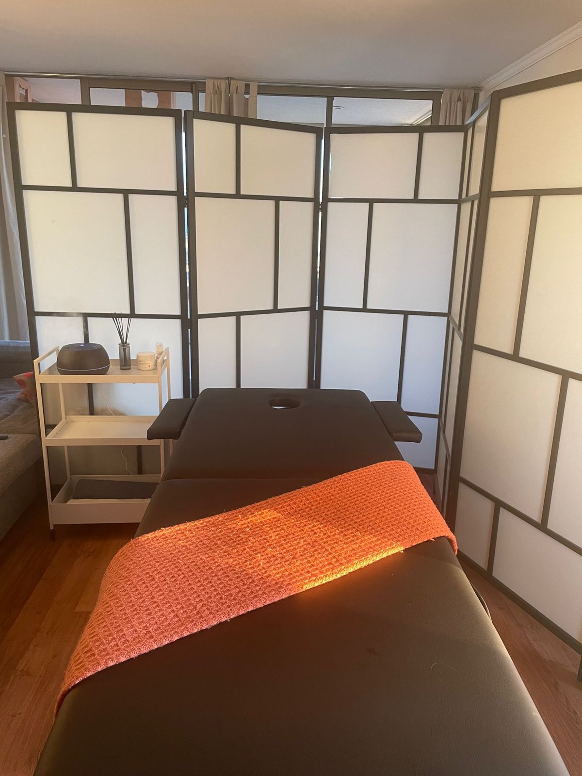 an abstract photo of a curved building with a blue sky in the background