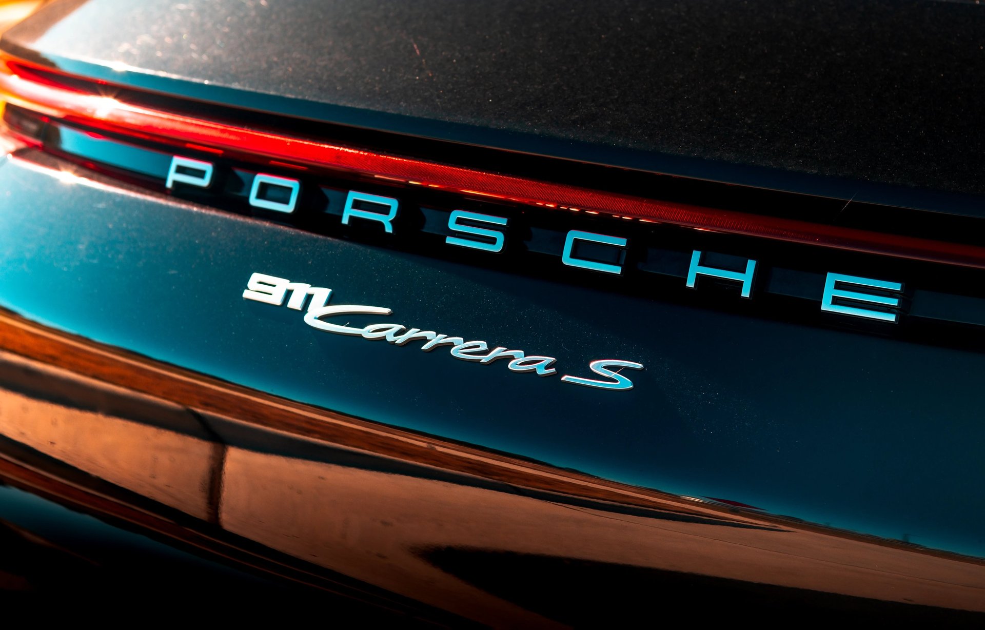 Sleek, black, and elegant BMW Coupe car photos taken at 704 Exotics in Charlotte, North Carolina.