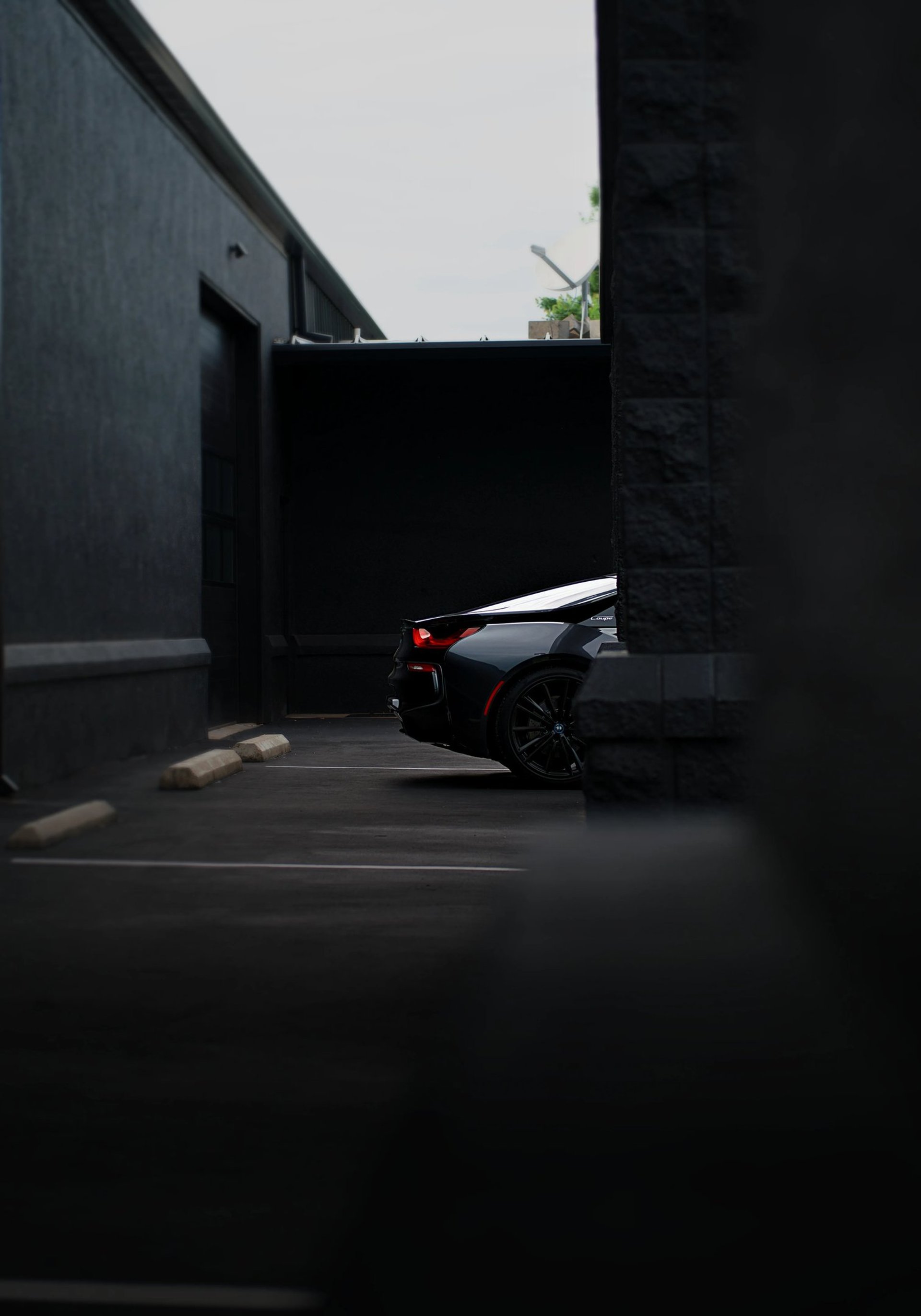 Sleek, black, and elegant BMW Coupe car photos taken at 704 Exotics in Charlotte, North Carolina.