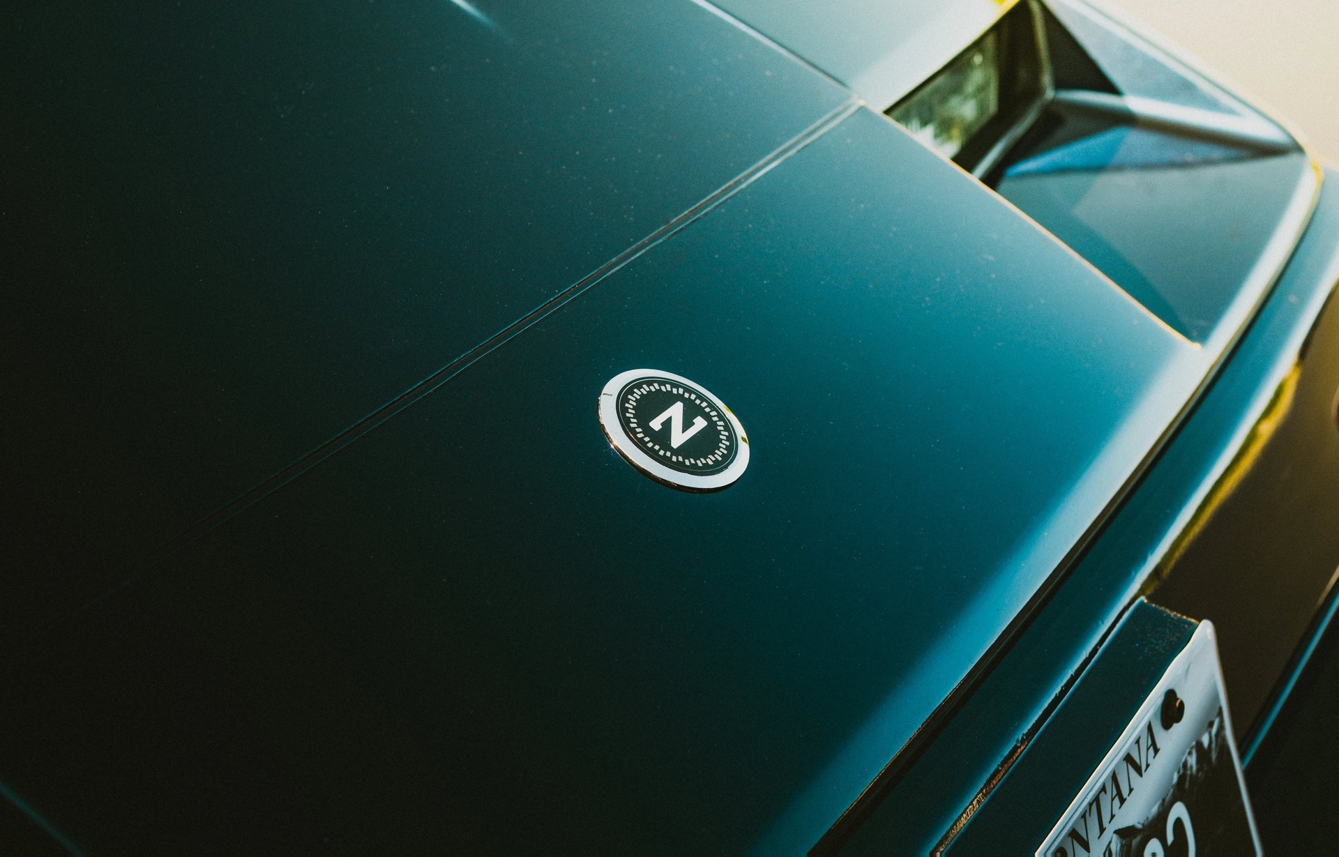 Electric blue BMW M3 Competition XDrive car photography at 704 Exotics in Charlotte, North Carolina.