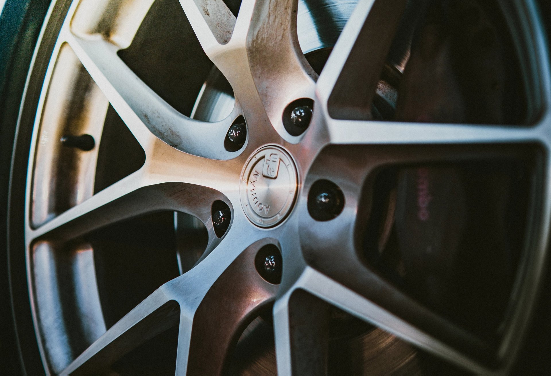 Electric blue BMW M3 Competition XDrive car photography at 704 Exotics in Charlotte, North Carolina.