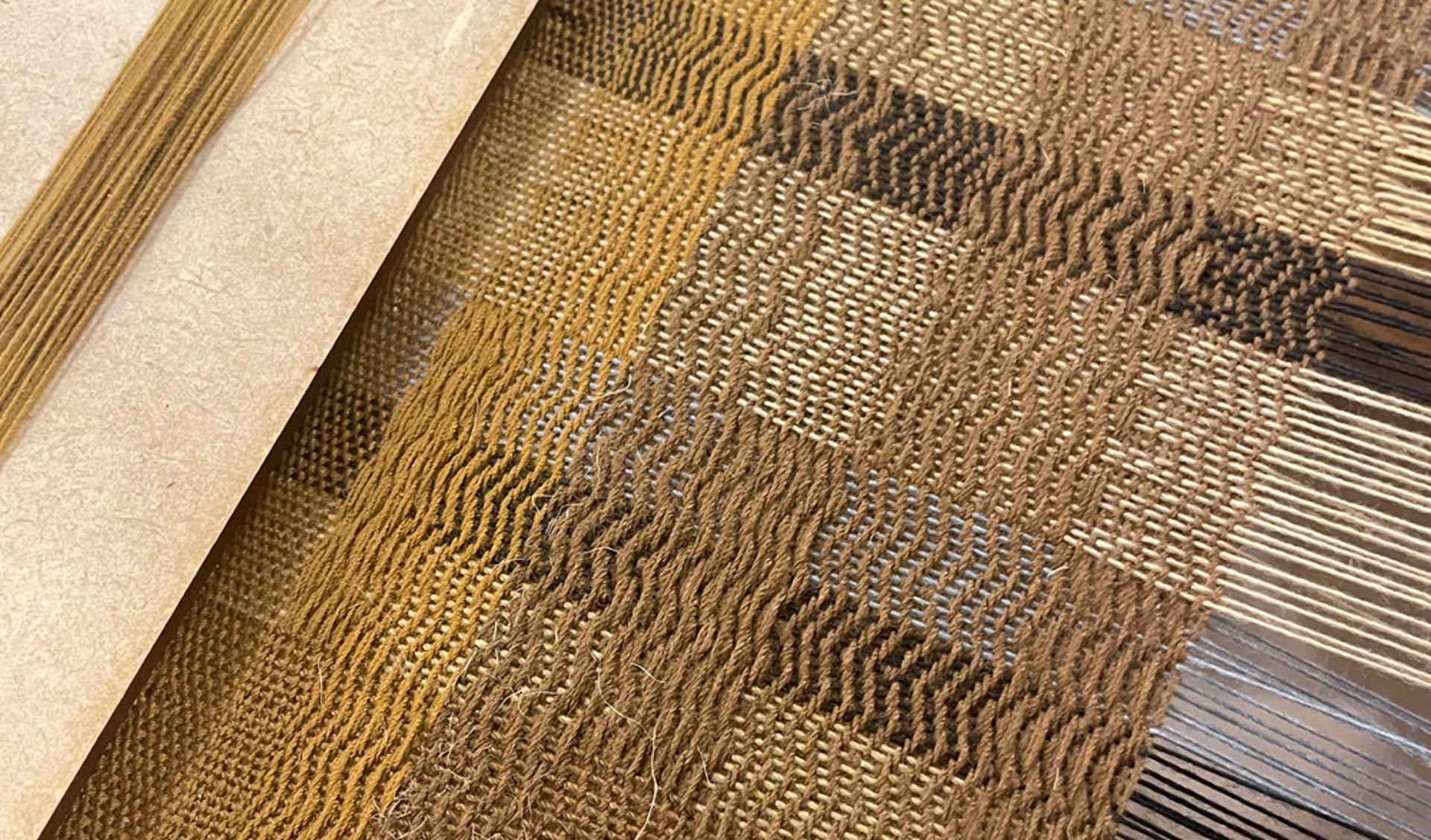 black and brown leather padded tub sofa