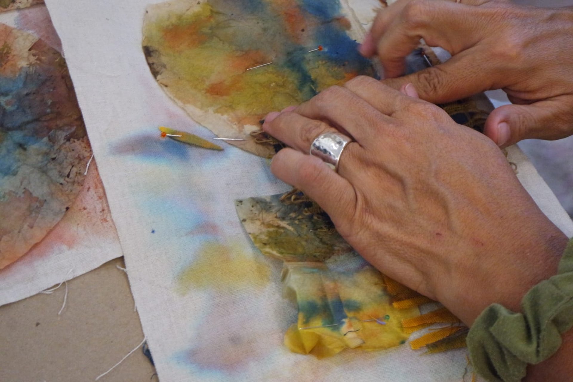 woman wearing yellow long-sleeved dress under white clouds and blue sky during daytime