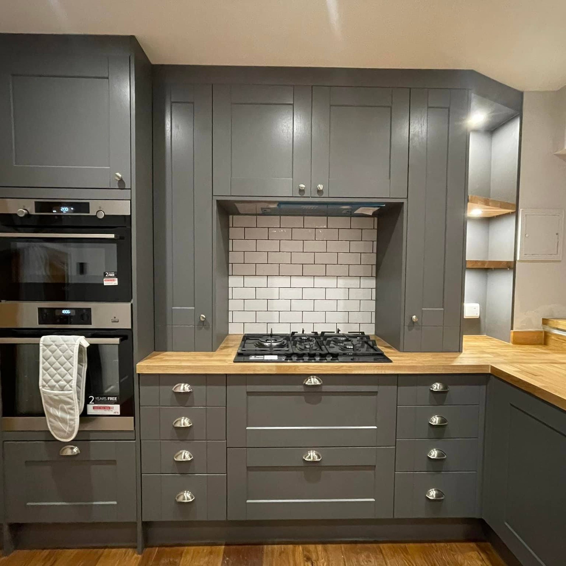 an abstract photo of a curved building with a blue sky in the background