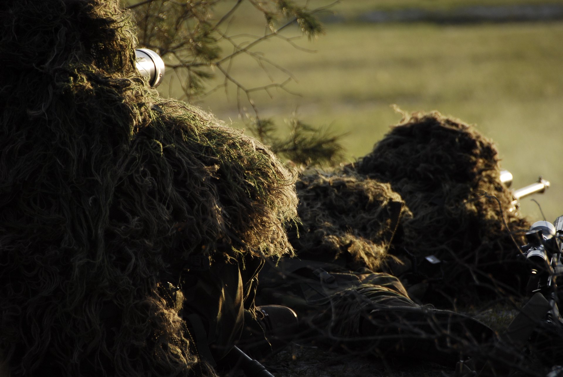 a candle is lit in front of a window