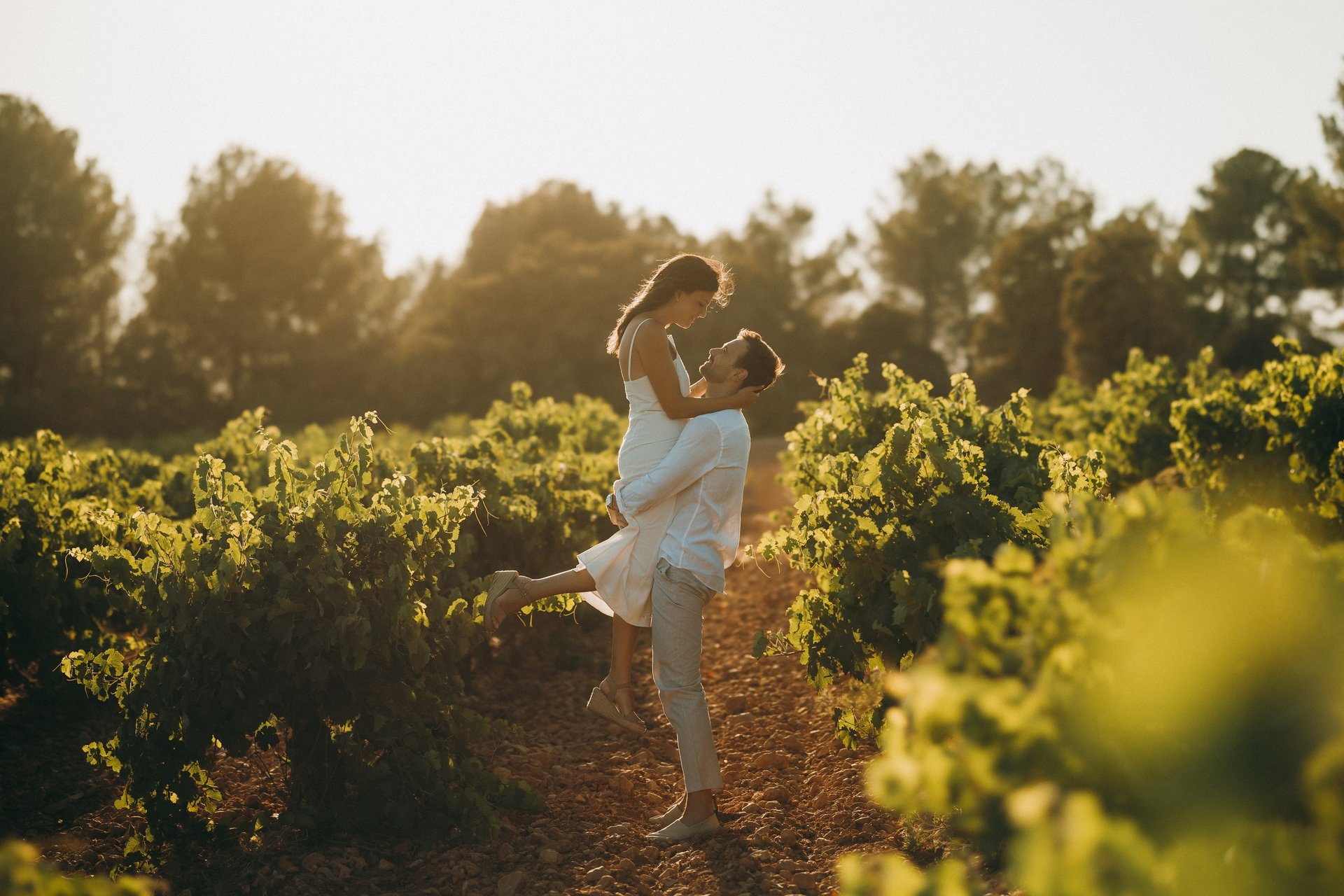 smiling man and woman about to kiss