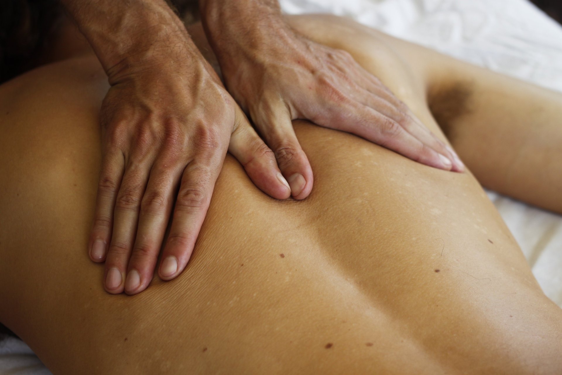 black and brown leather padded tub sofa
