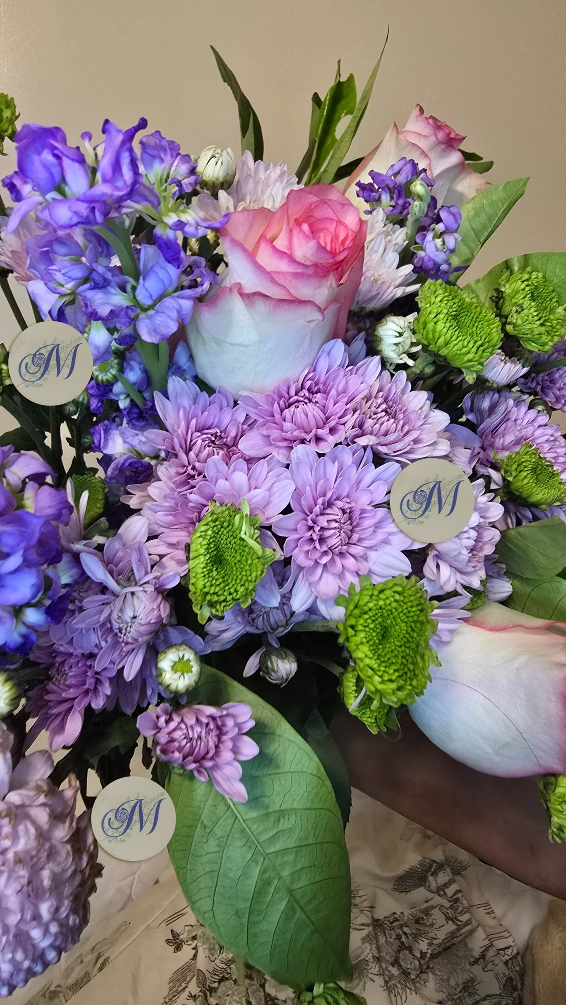 couple wearing silver-colored rings