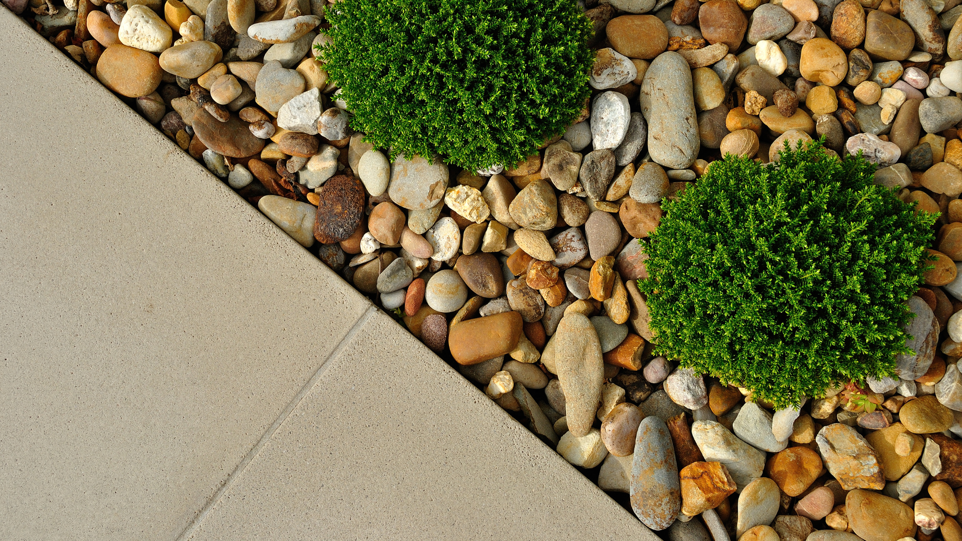an abstract photo of a curved building with a blue sky in the background