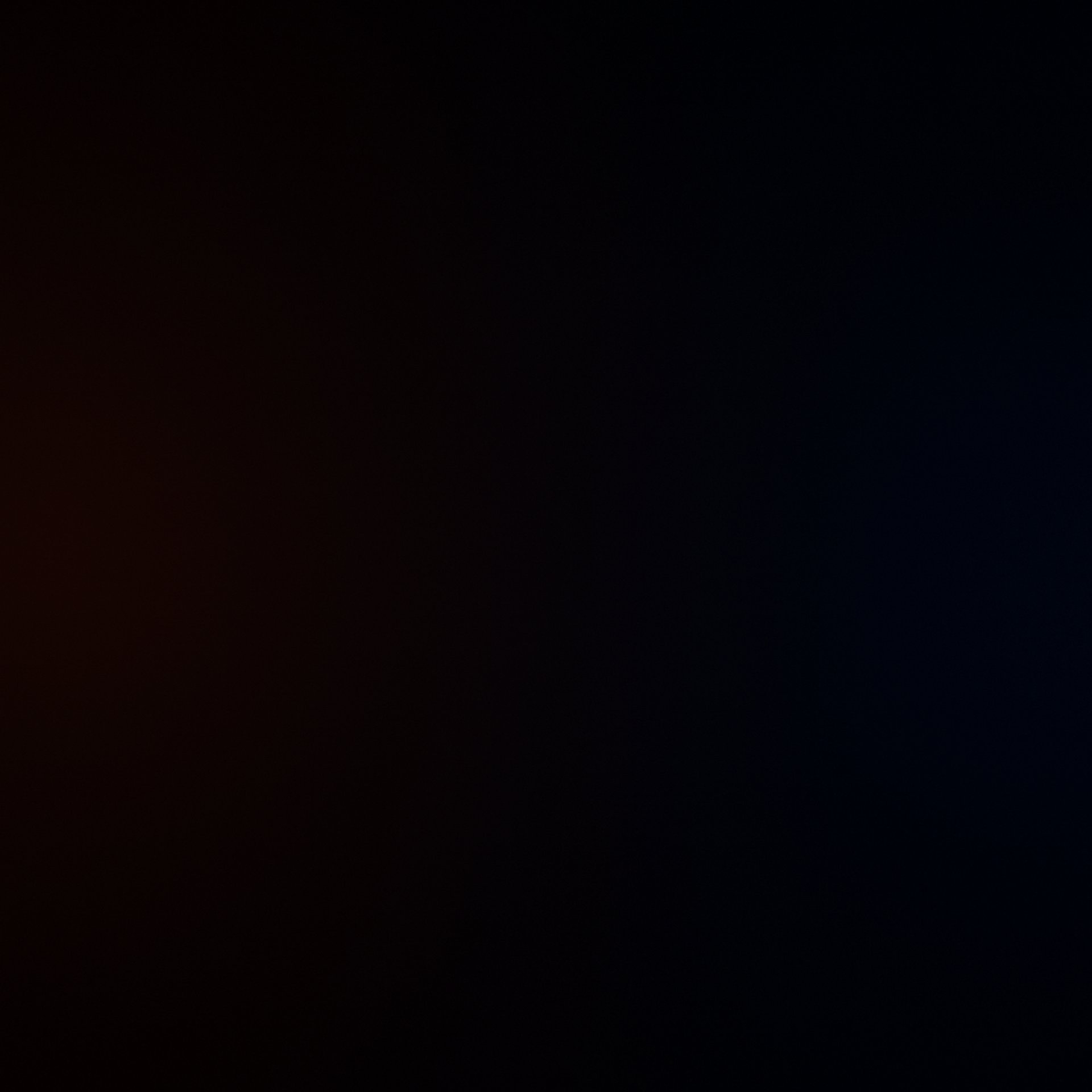 person standing in stage in front of people