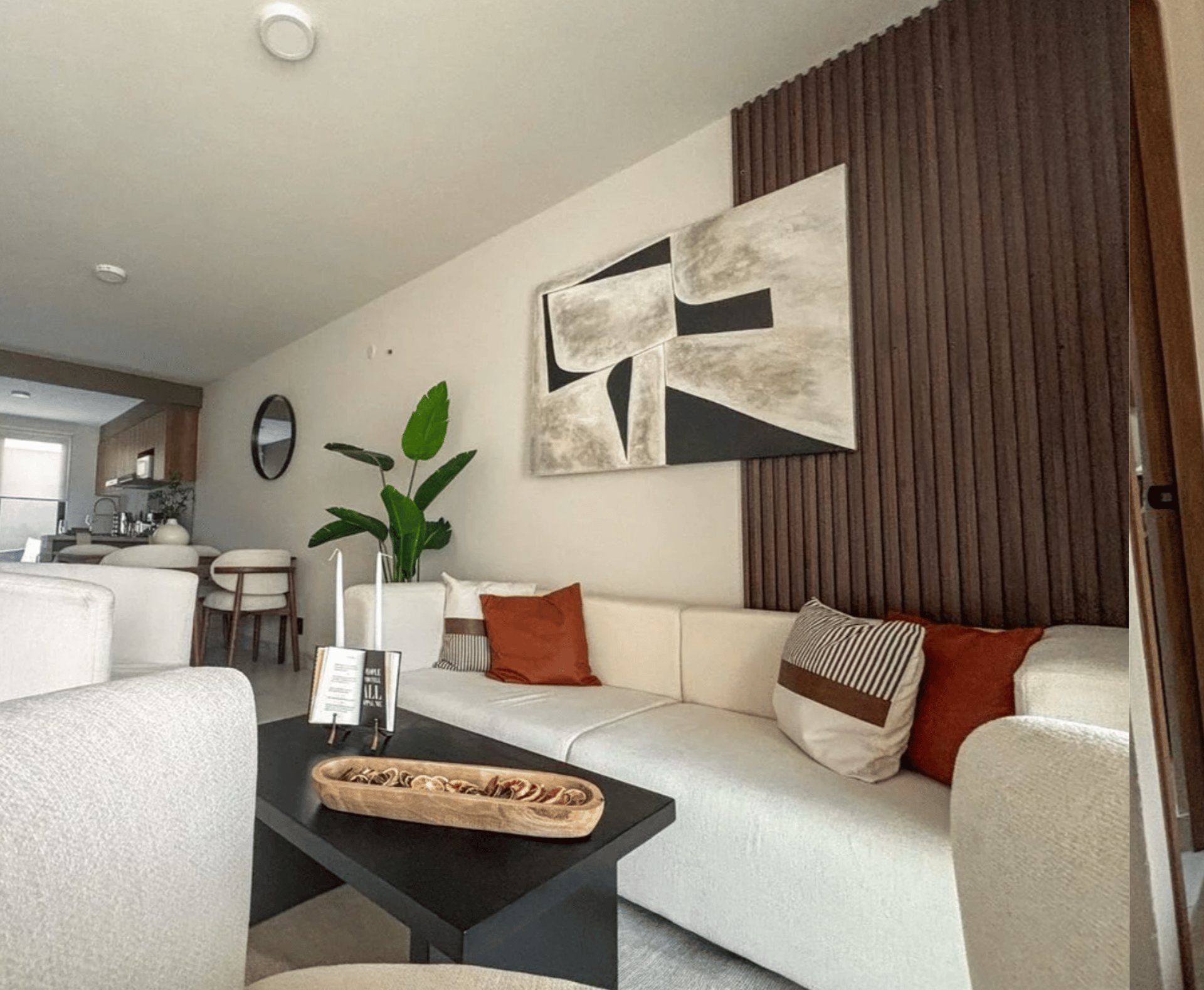 an abstract photo of a curved building with a blue sky in the background