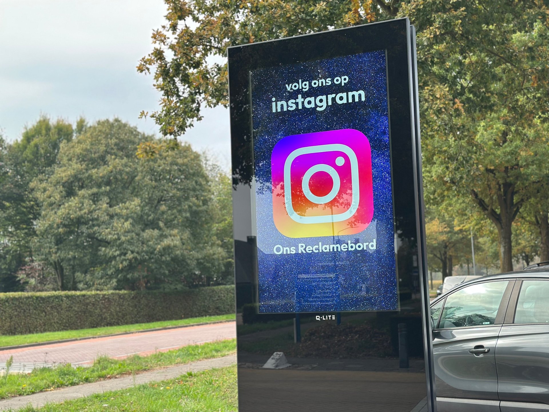 an abstract photo of a curved building with a blue sky in the background
