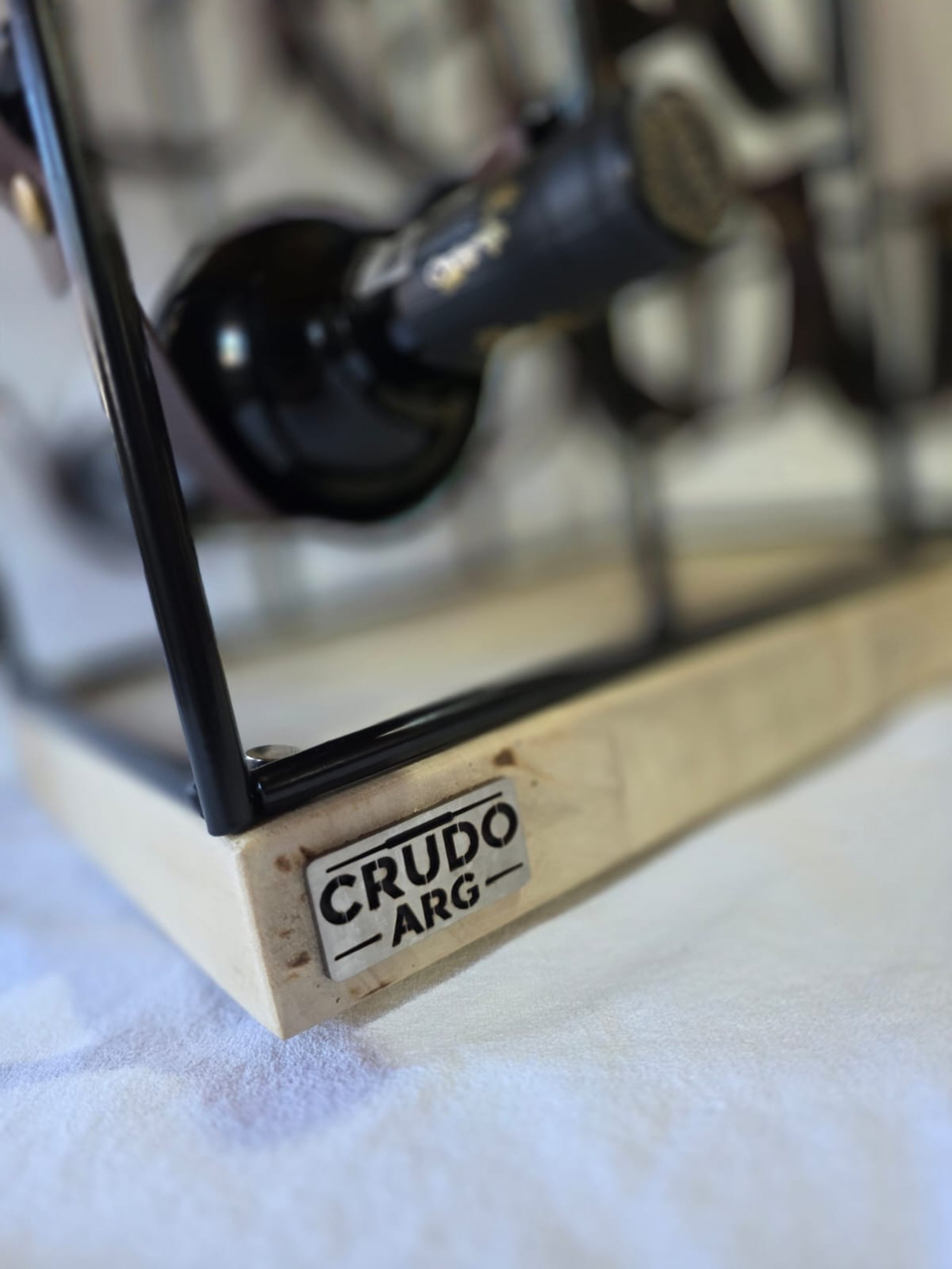 a close up of a black and brown abstract painting