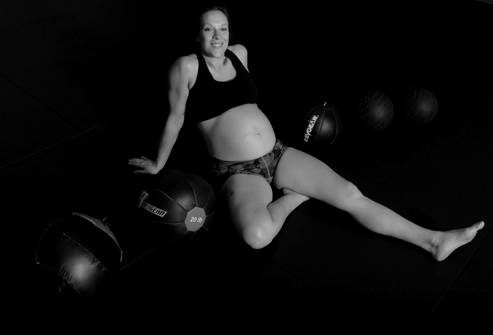 black and brown leather padded tub sofa