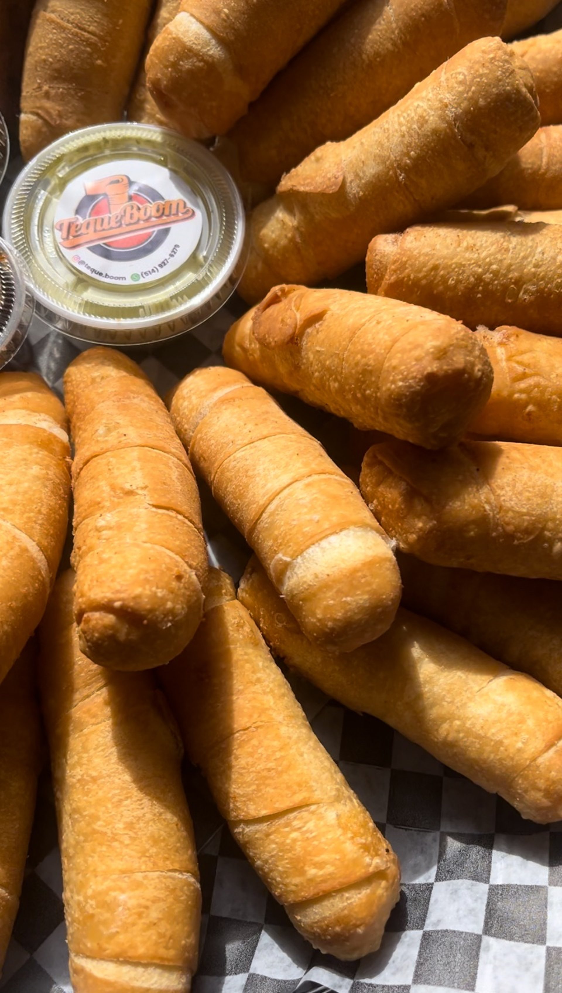 a close up of a black and brown abstract painting