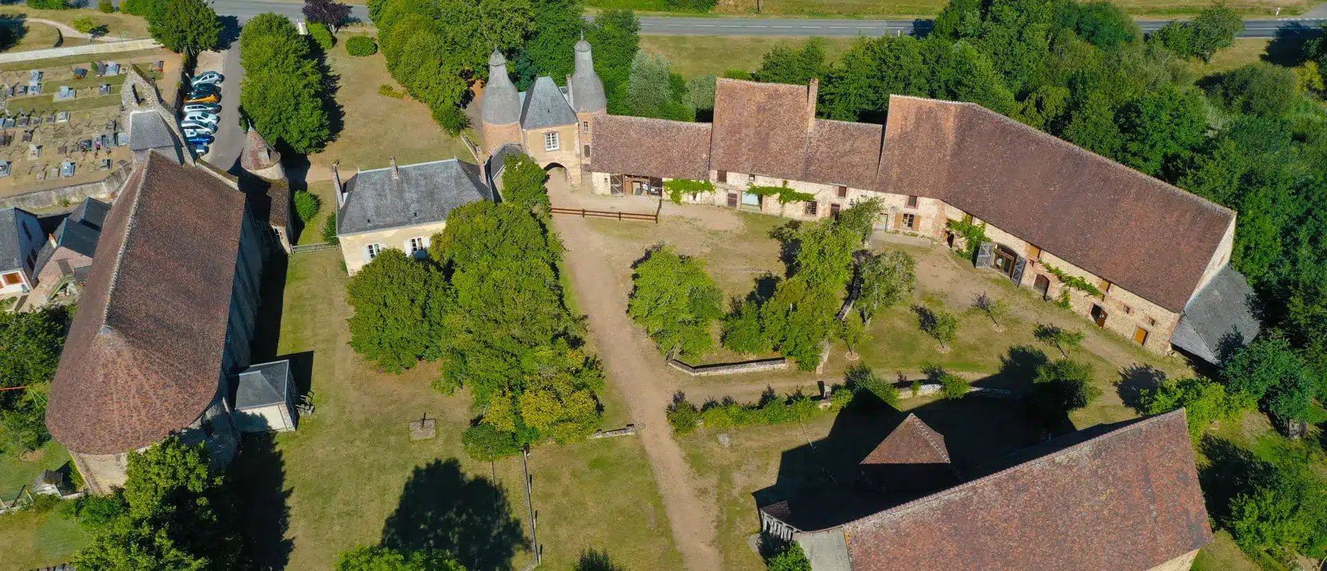 an abstract photo of a curved building with a blue sky in the background