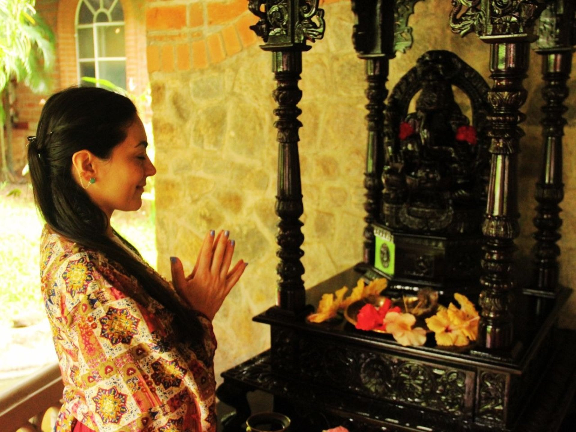 woman wearing yellow long-sleeved dress under white clouds and blue sky during daytime