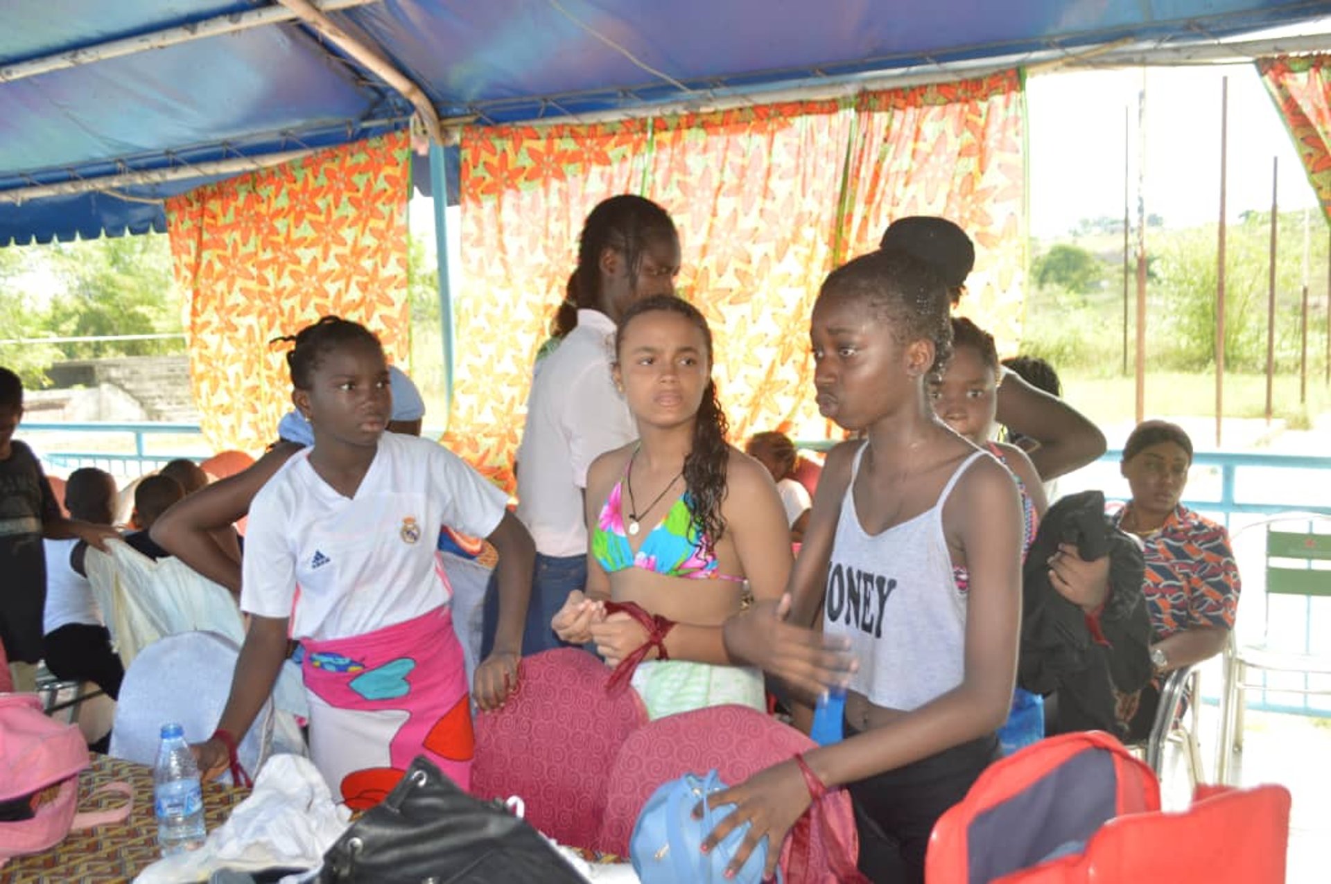 boy holding white paper