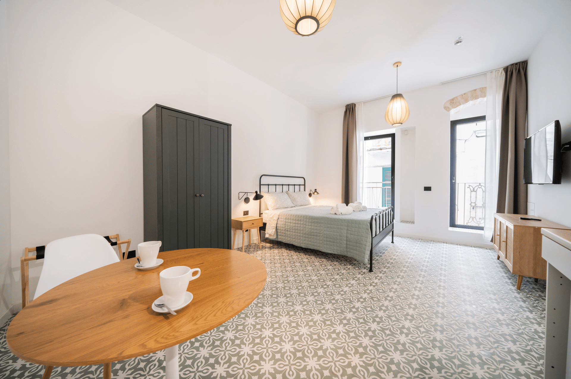 an abstract photo of a curved building with a blue sky in the background