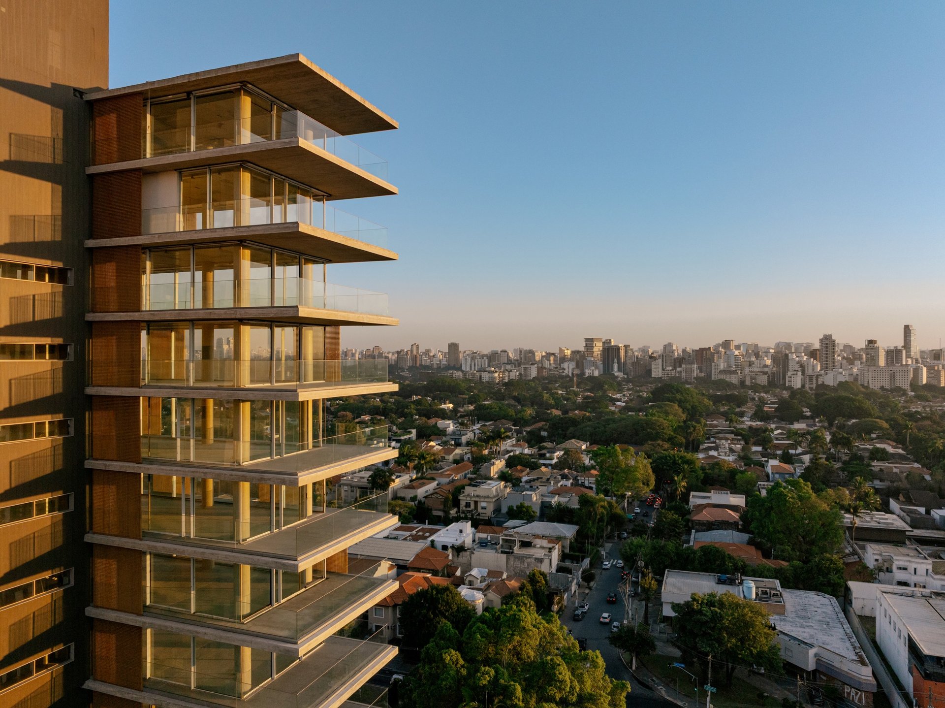 black and brown leather padded tub sofa