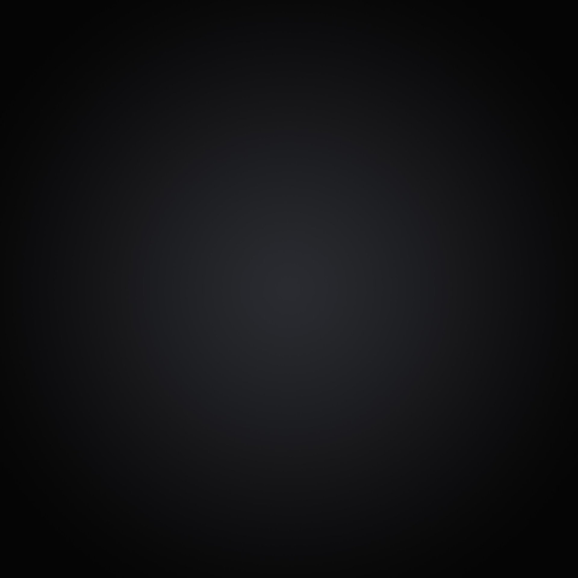 a black and white photo of a dark background