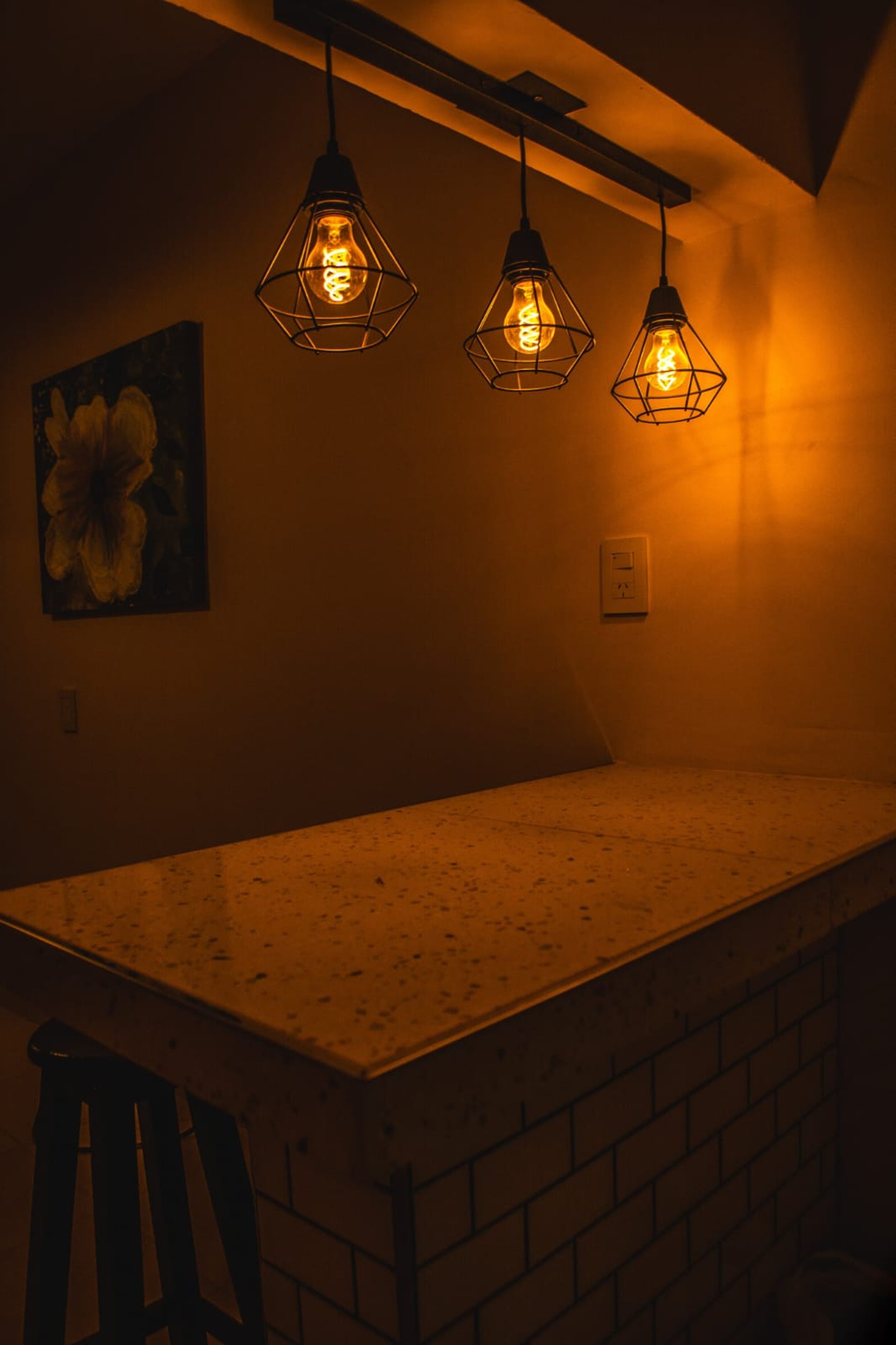 gray and black throw pillow on bed