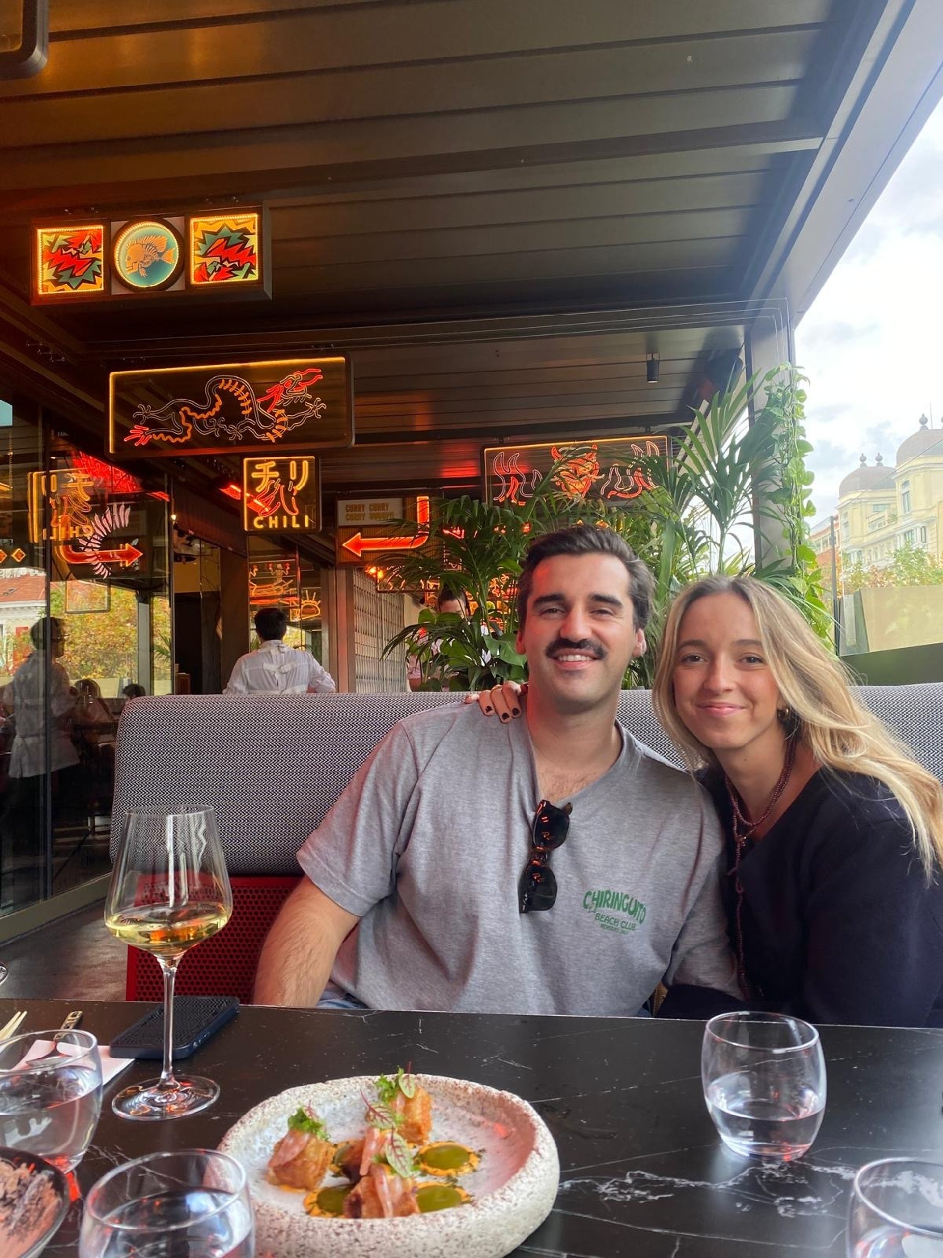 couple wearing silver-colored rings