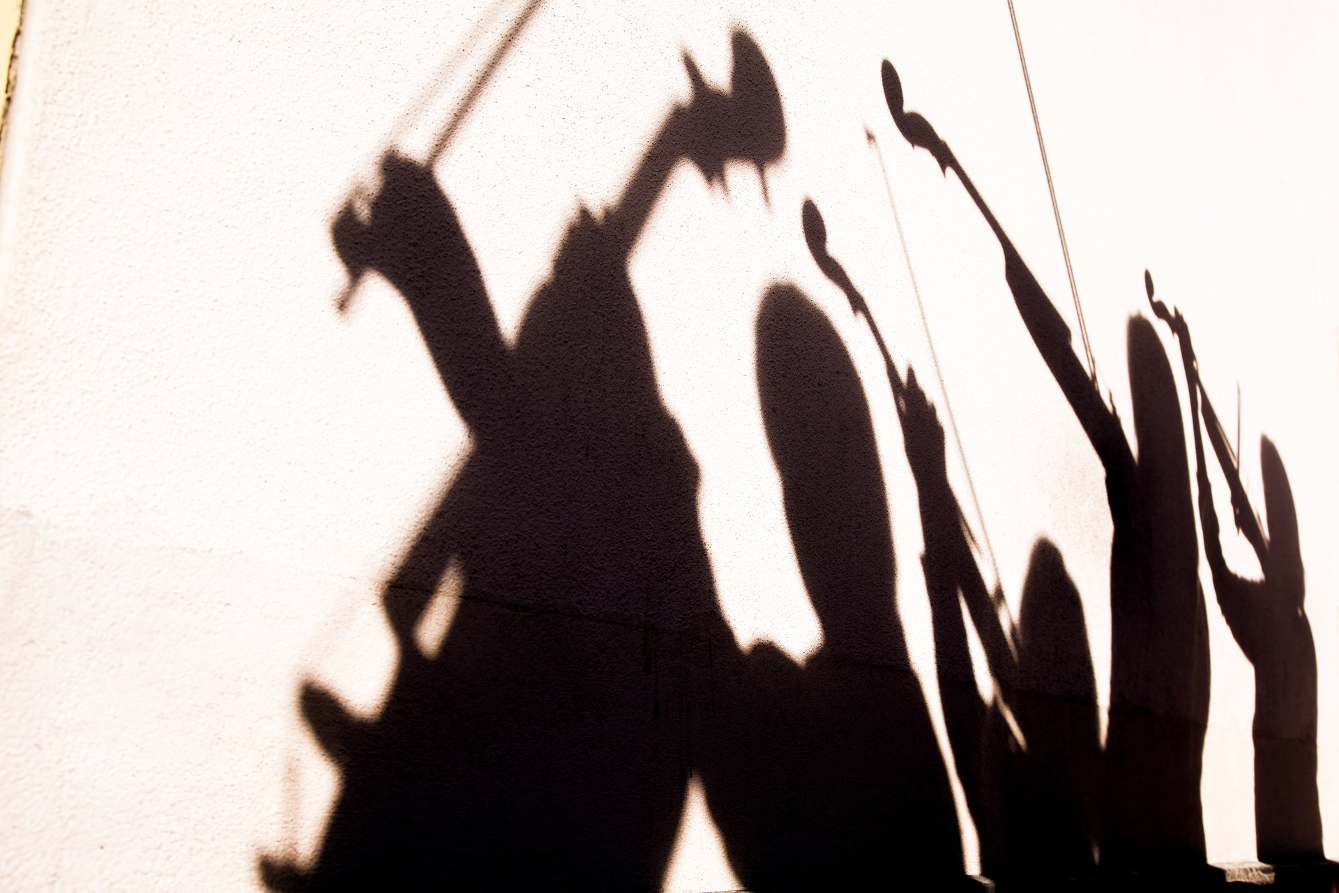 woman wearing yellow long-sleeved dress under white clouds and blue sky during daytime