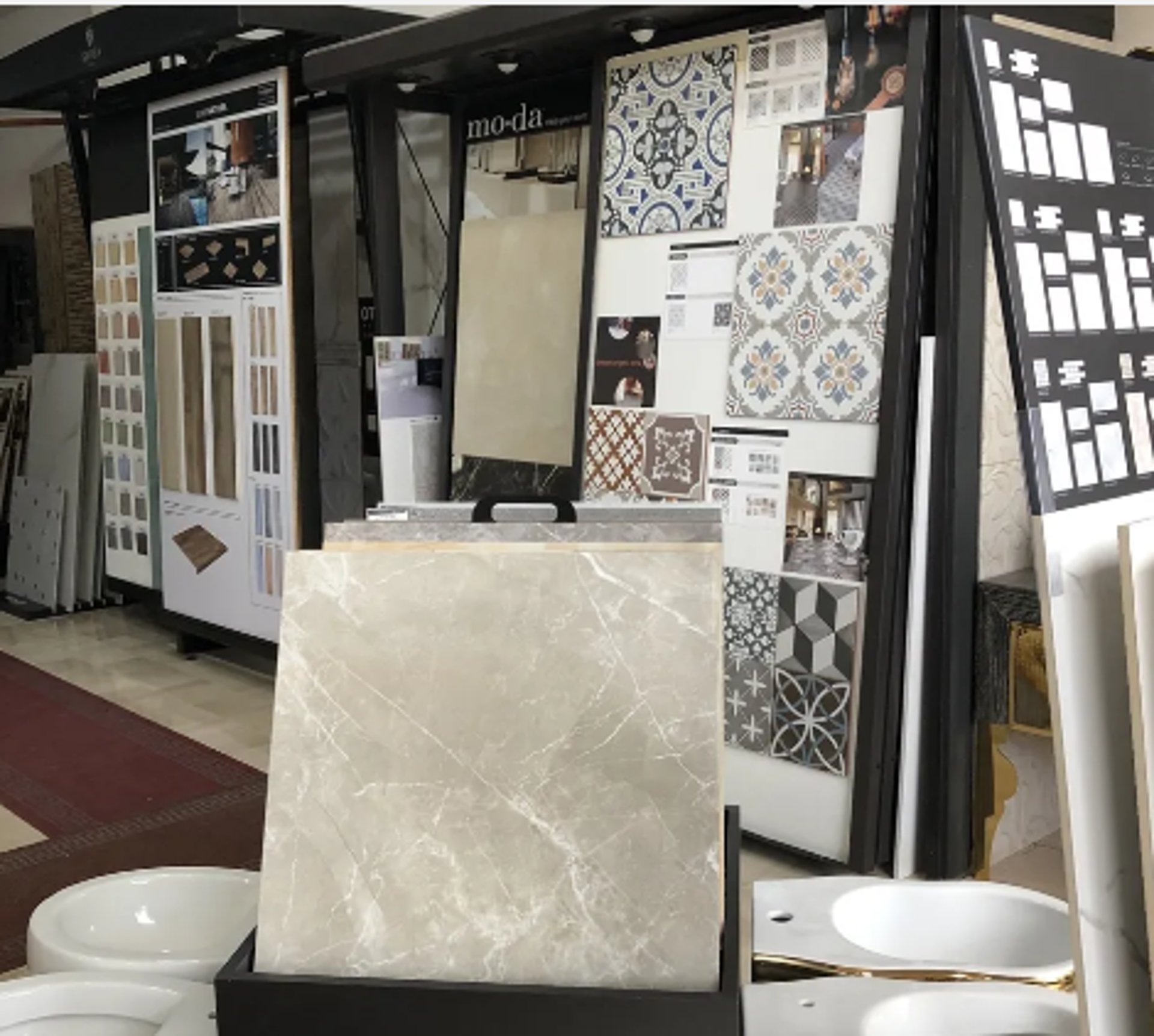 an abstract photo of a curved building with a blue sky in the background