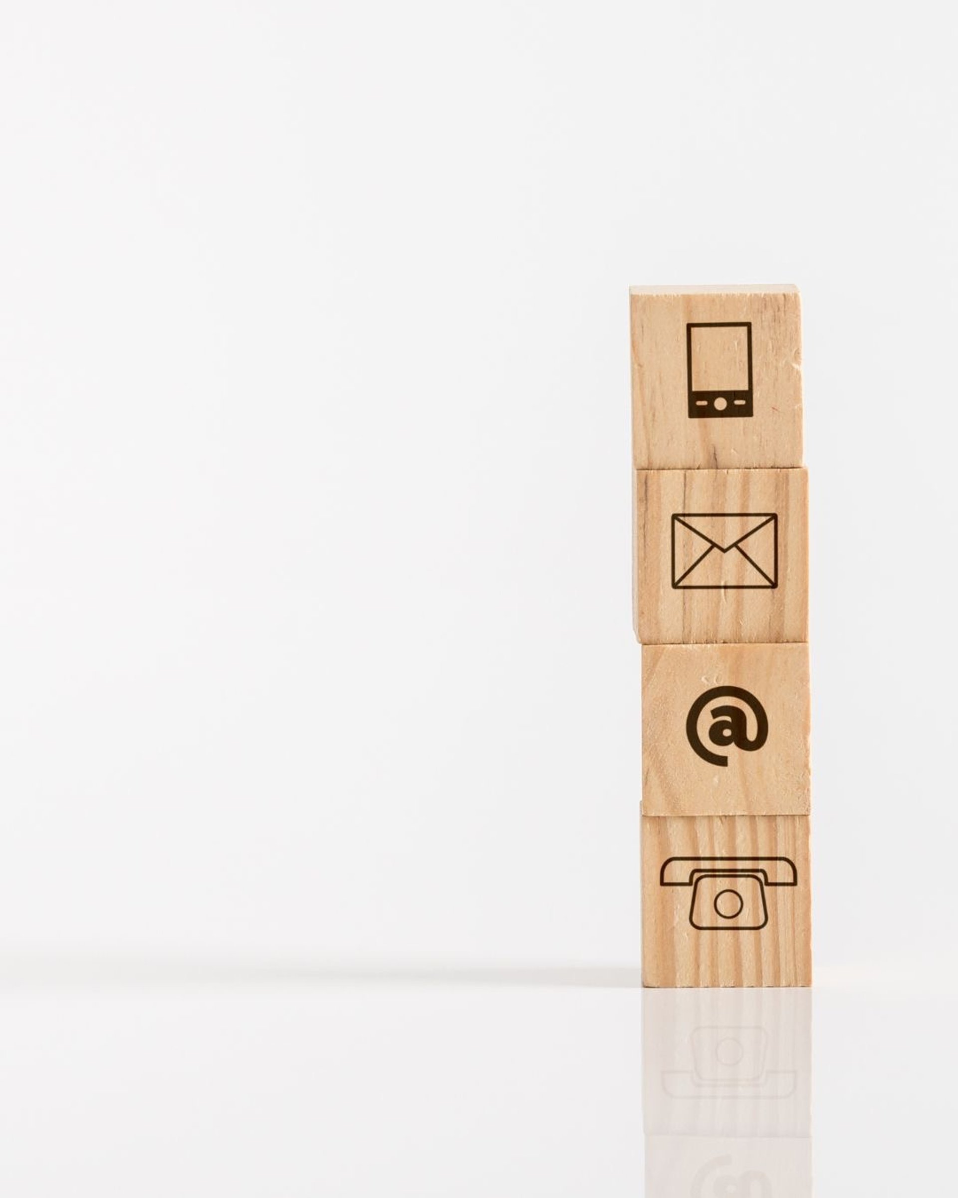 white and black dice on green textile