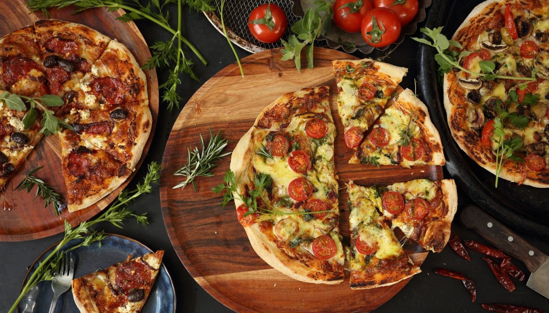 a silver plate topped with rice and different types of food