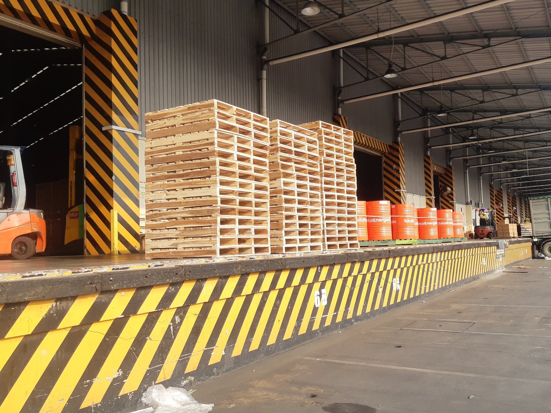 a pile of wooden pallets stacked on top of each other