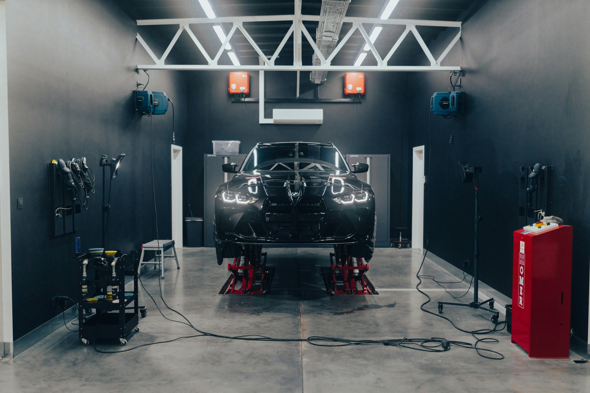 an abstract photo of a curved building with a blue sky in the background