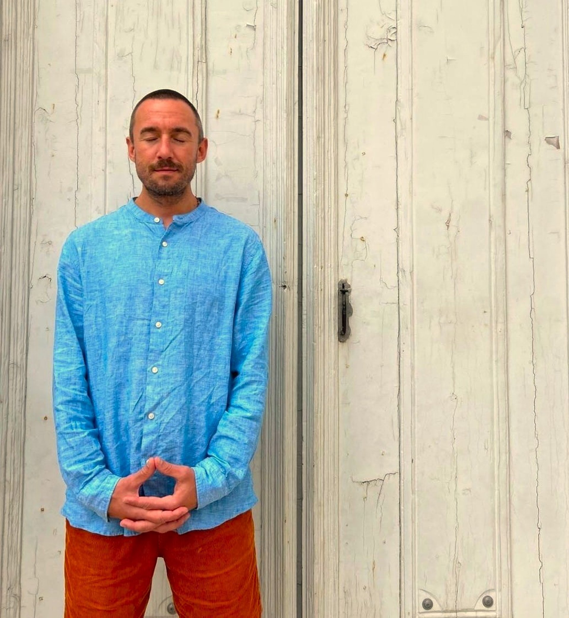 grayscale photo of closed-eyes woman