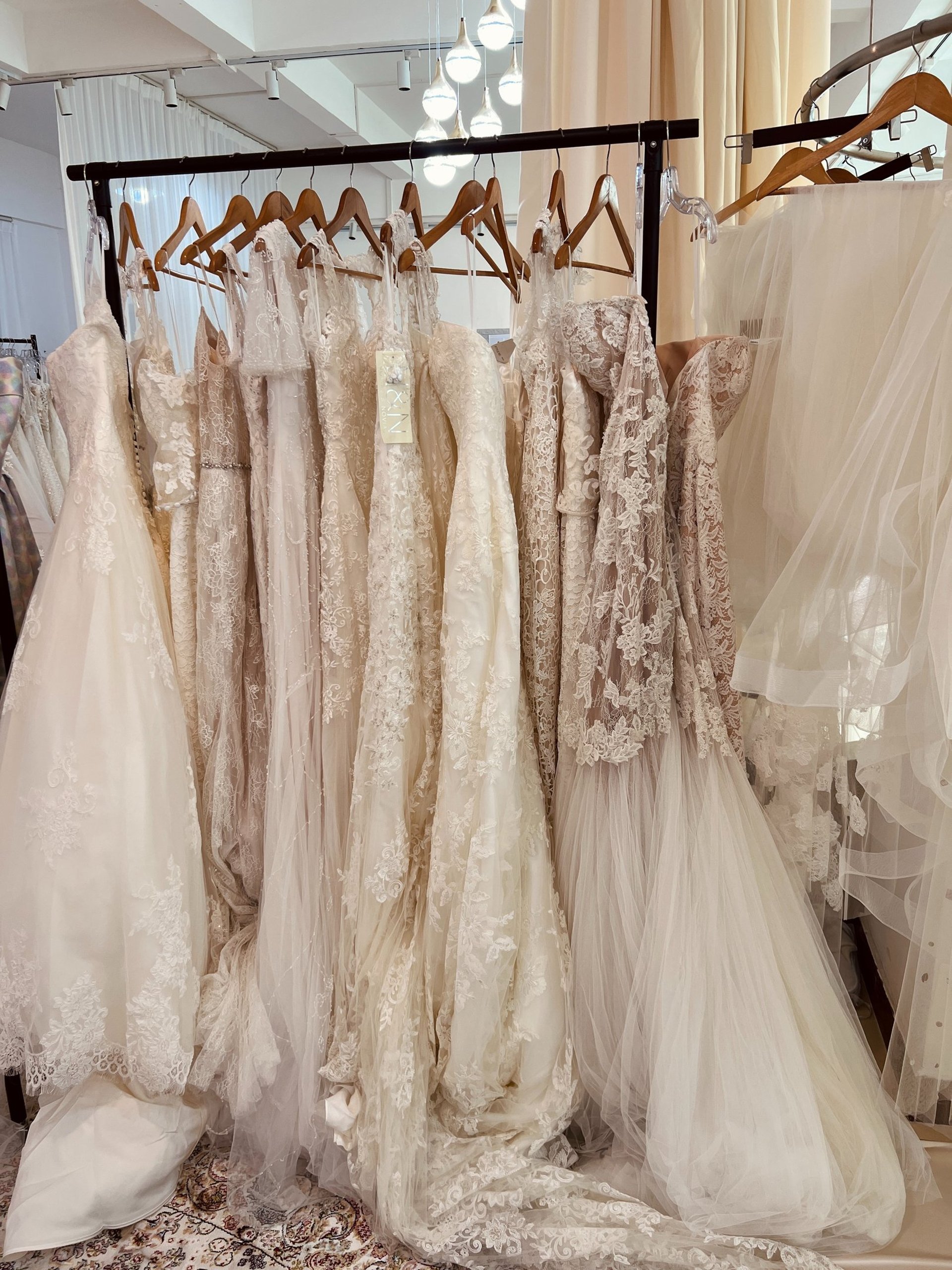 an abstract photo of a curved building with a blue sky in the background