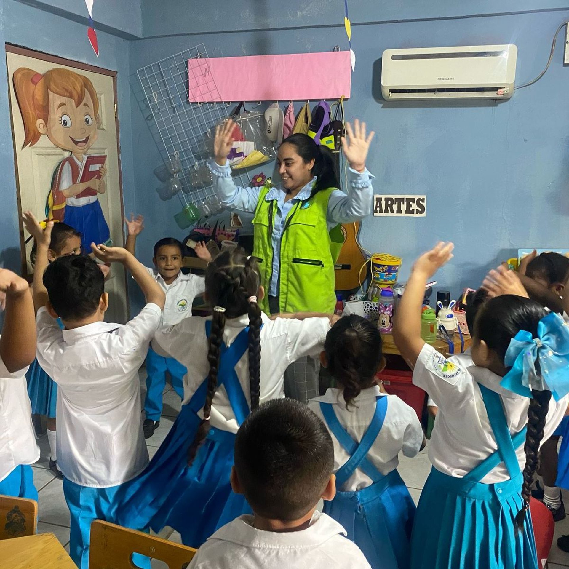 an abstract photo of a curved building with a blue sky in the background
