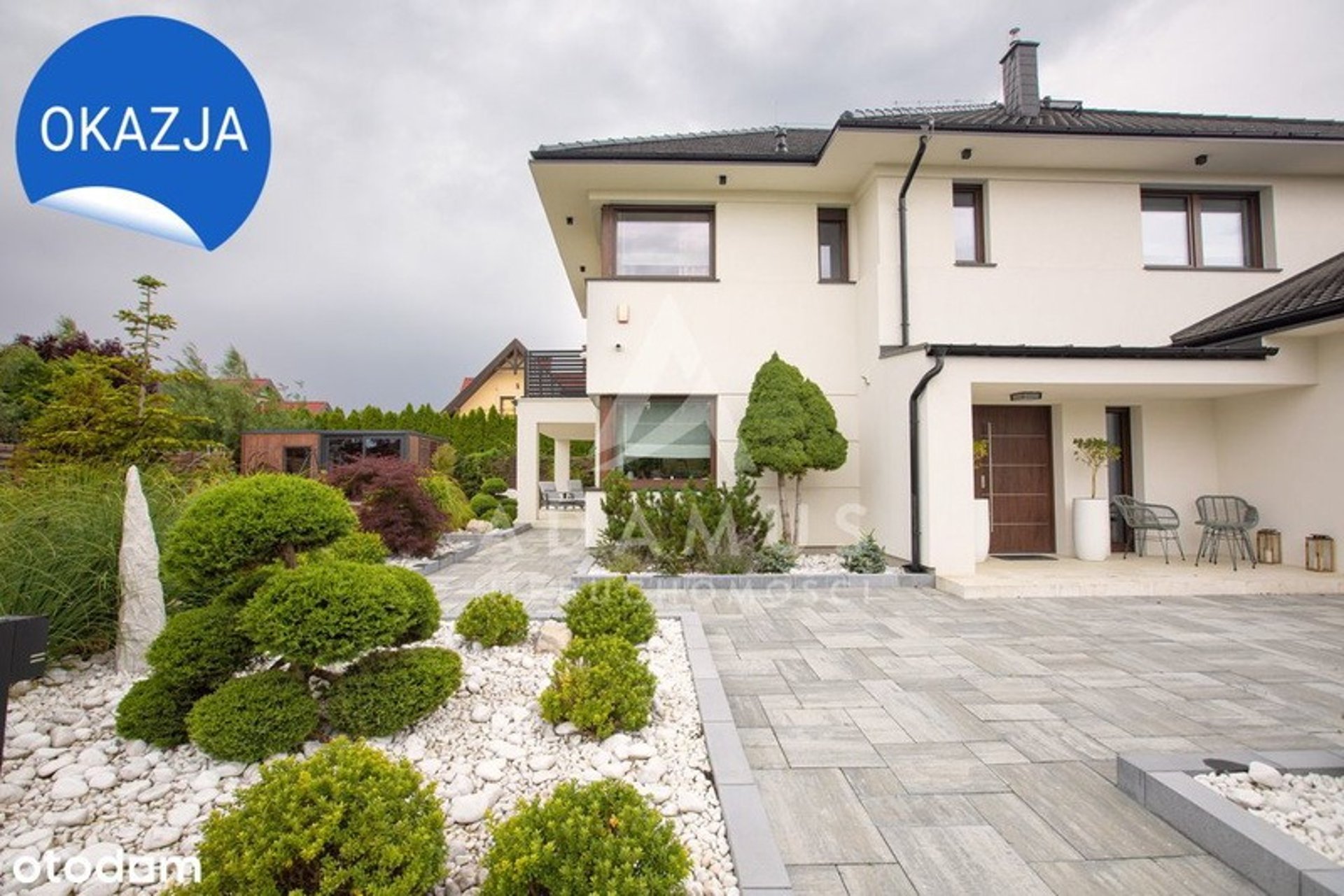 black and brown leather padded tub sofa