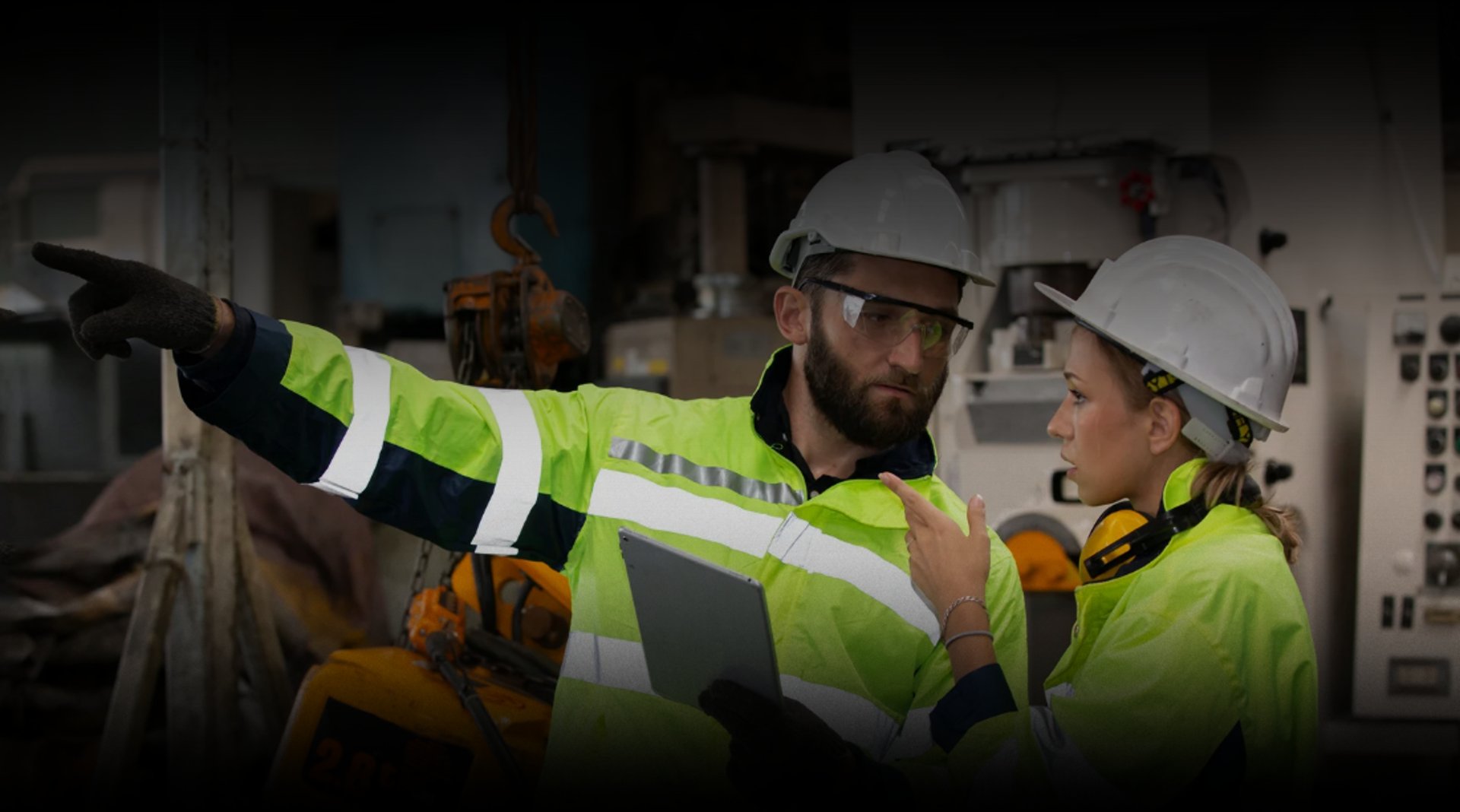 a large red and white machine in a factory