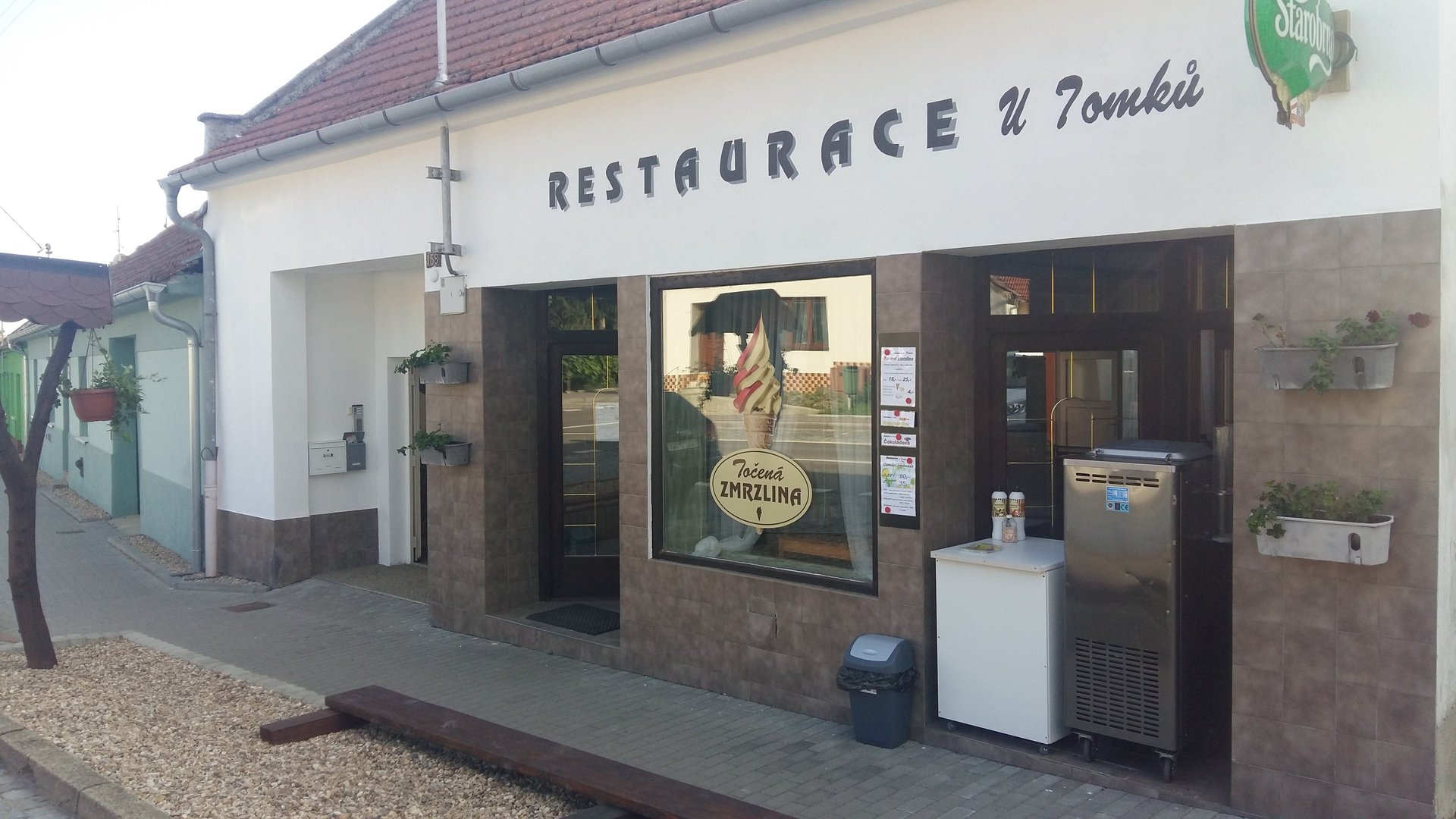 woman wearing yellow long-sleeved dress under white clouds and blue sky during daytime