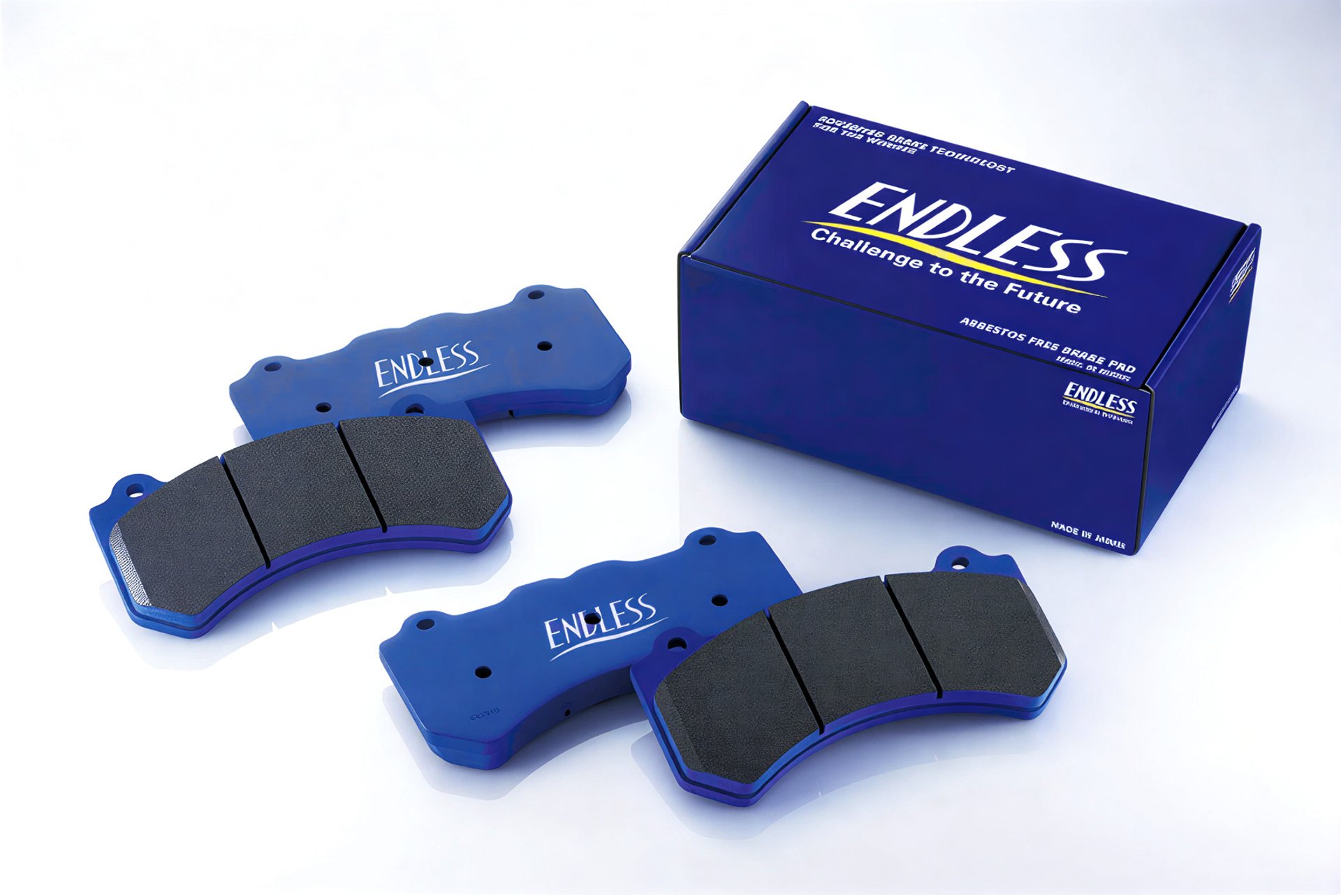 an abstract photo of a curved building with a blue sky in the background