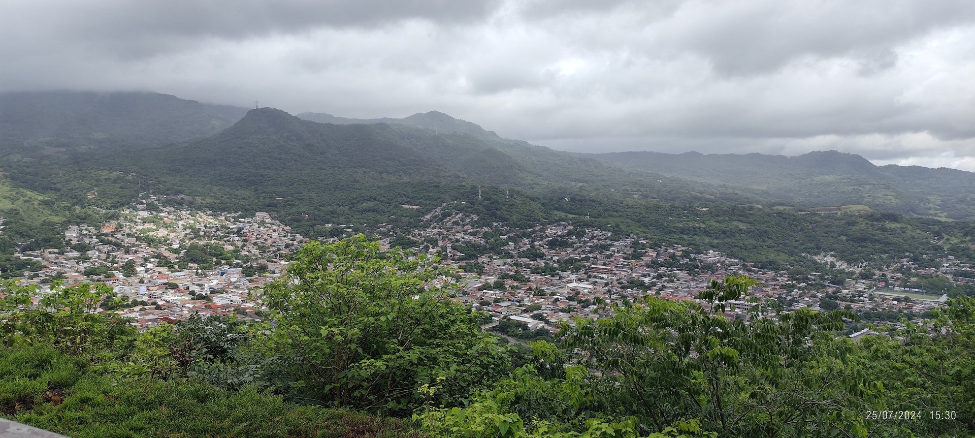 woman wearing yellow long-sleeved dress under white clouds and blue sky during daytime