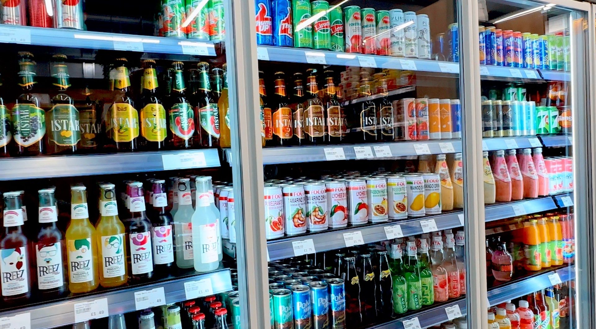 assorted-labeled bottle display on rack