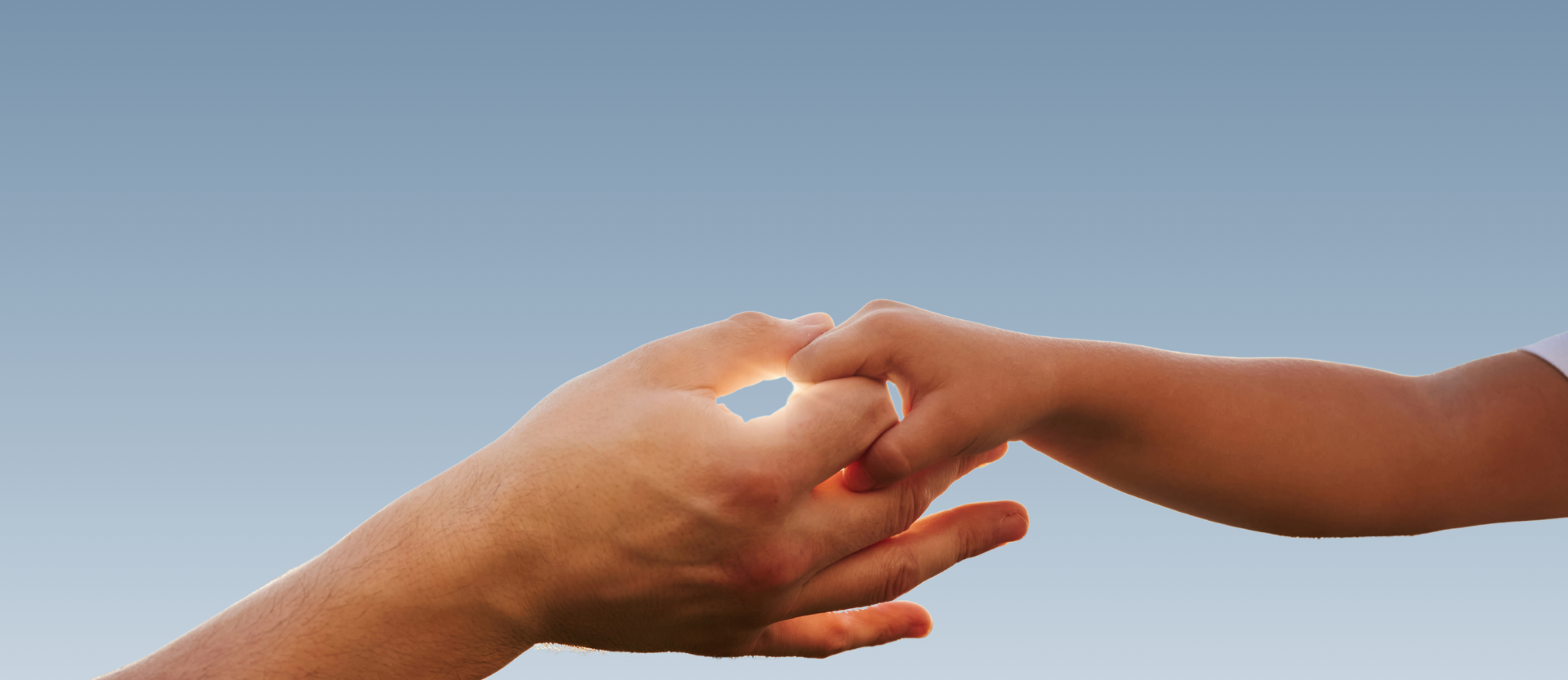woman wearing yellow long-sleeved dress under white clouds and blue sky during daytime