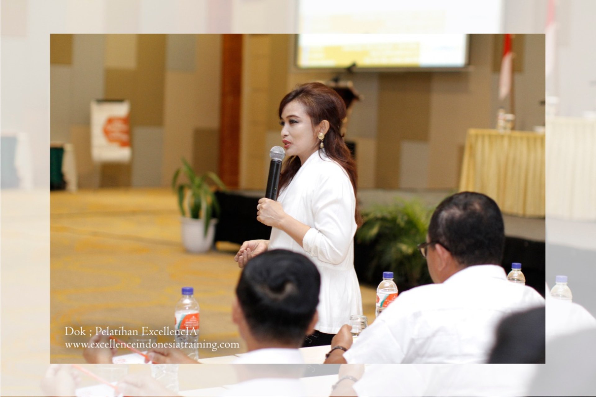 woman in white hijab smiling