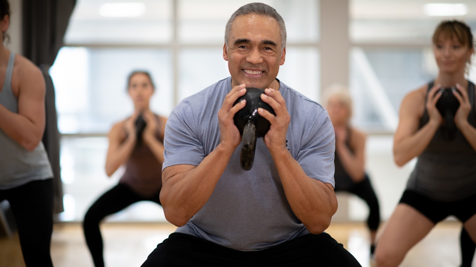 an abstract photo of a curved building with a blue sky in the background
