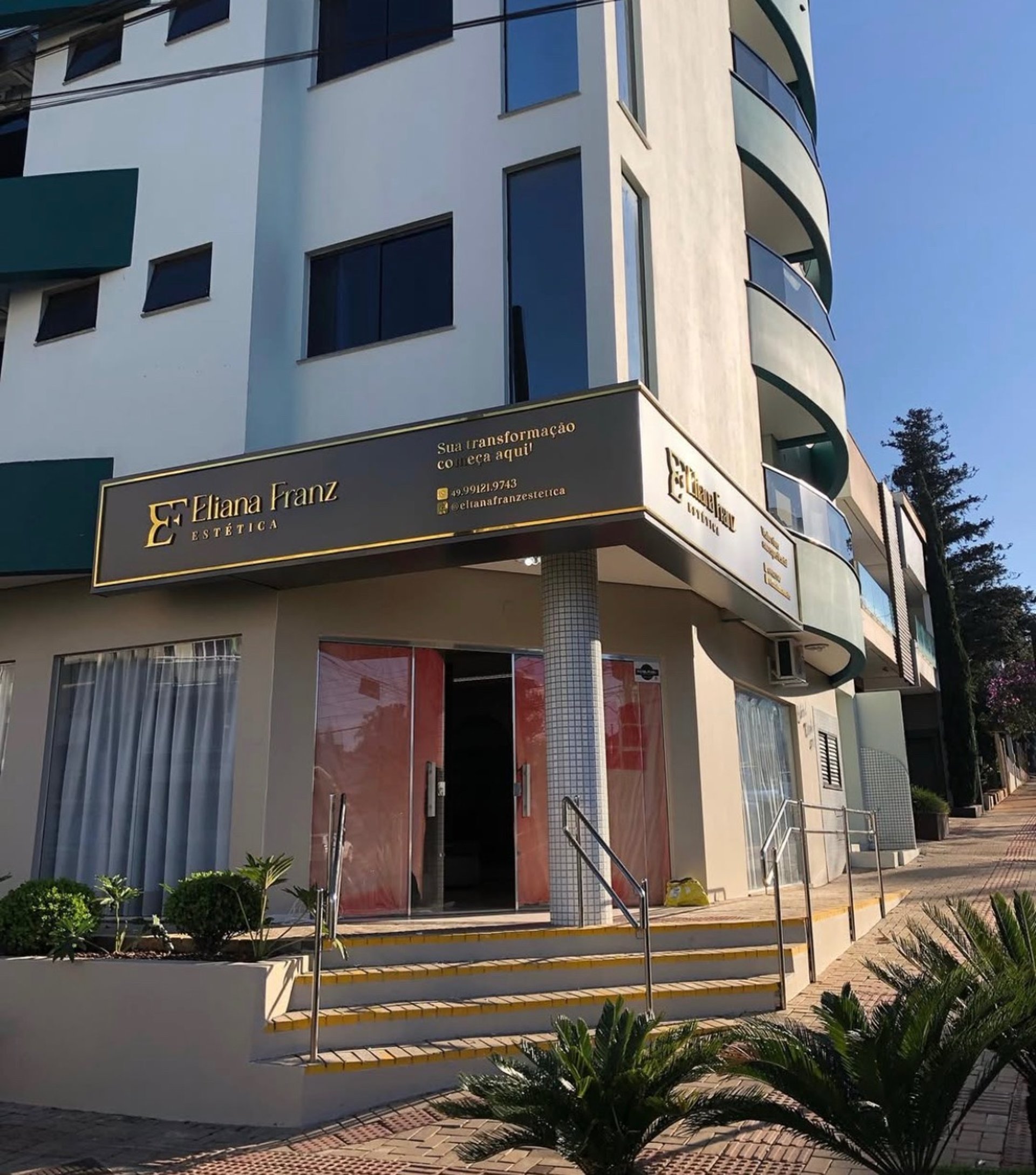 woman wearing yellow long-sleeved dress under white clouds and blue sky during daytime