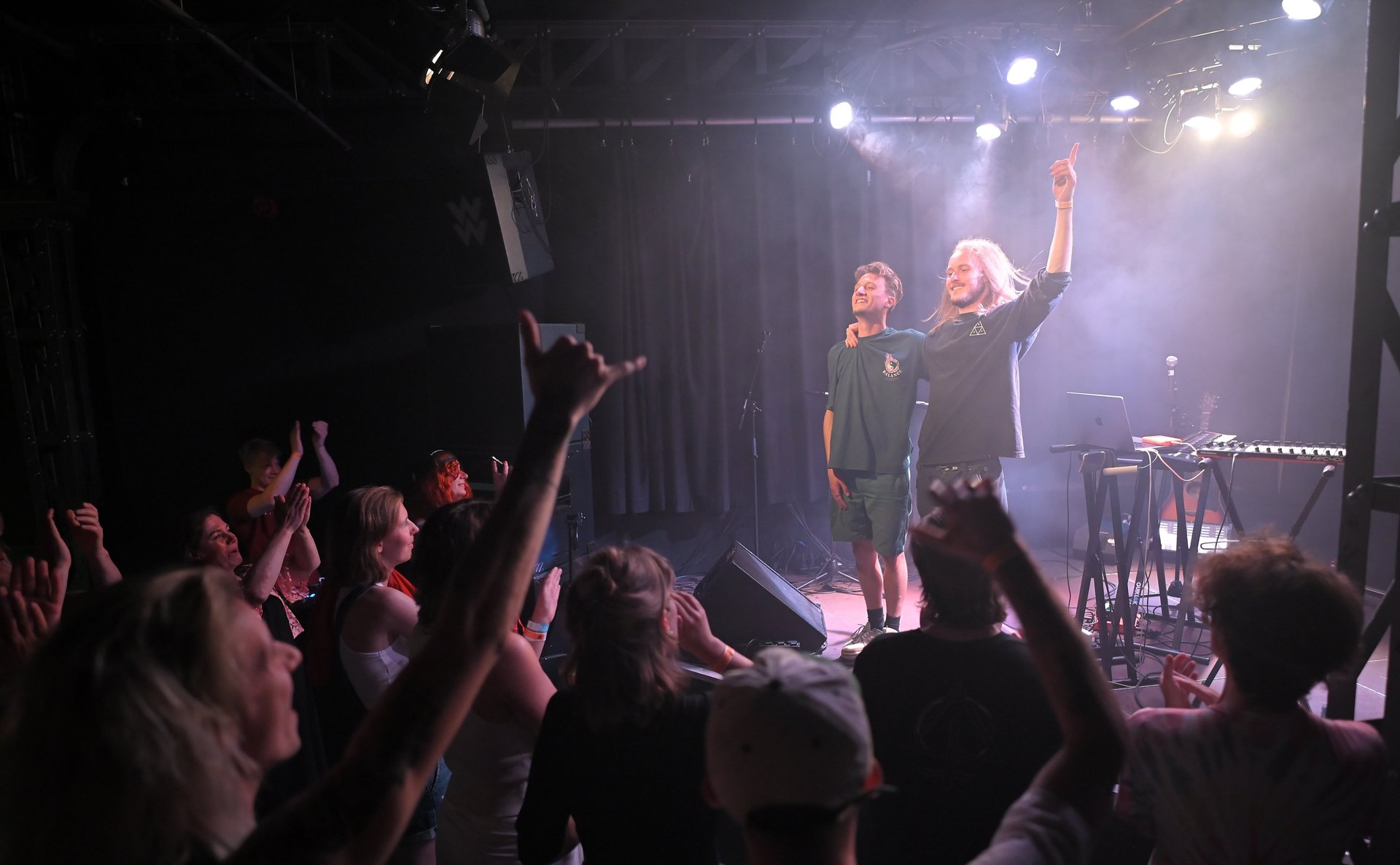 an abstract photo of a curved building with a blue sky in the background
