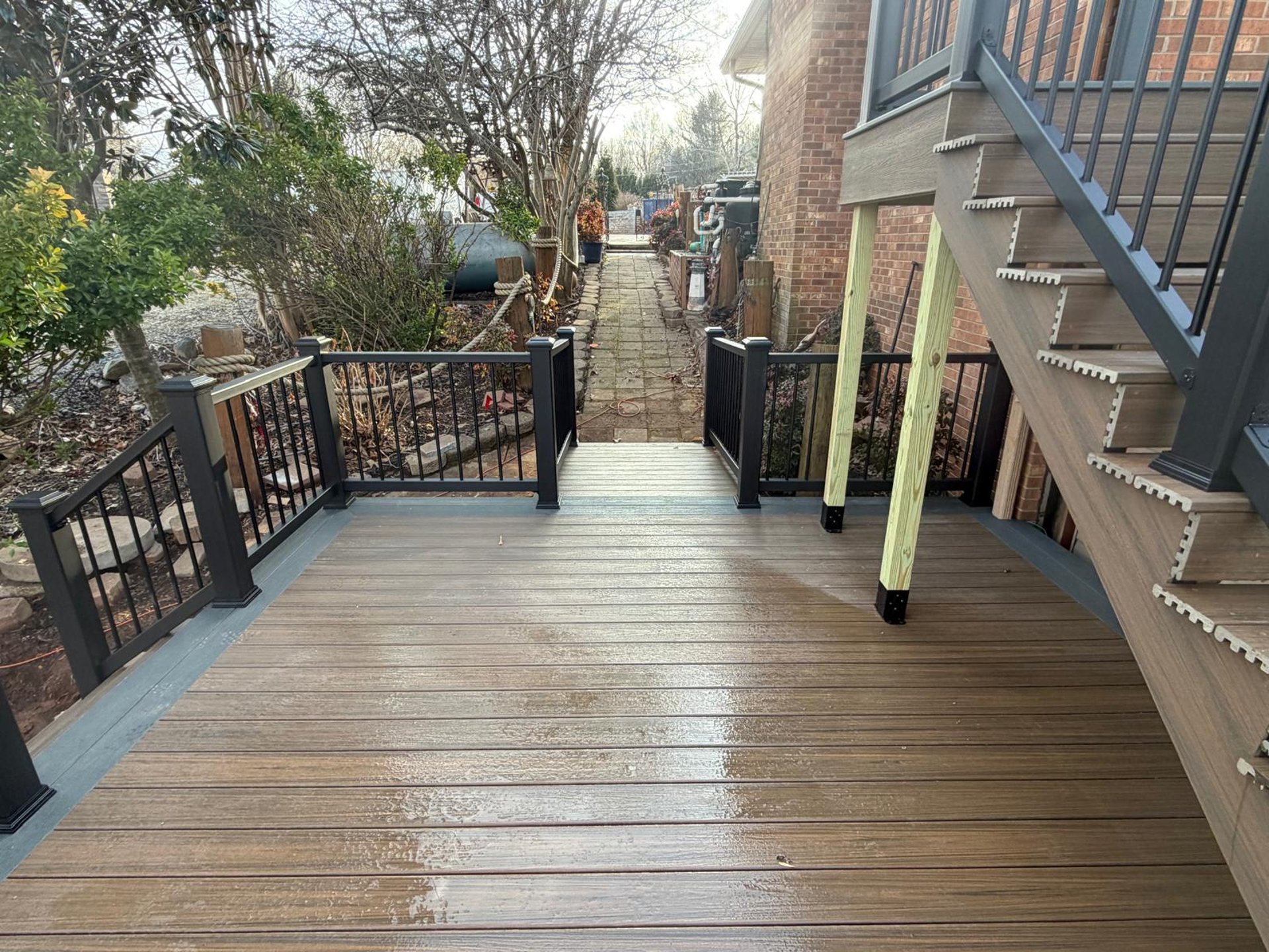 black and brown leather padded tub sofa